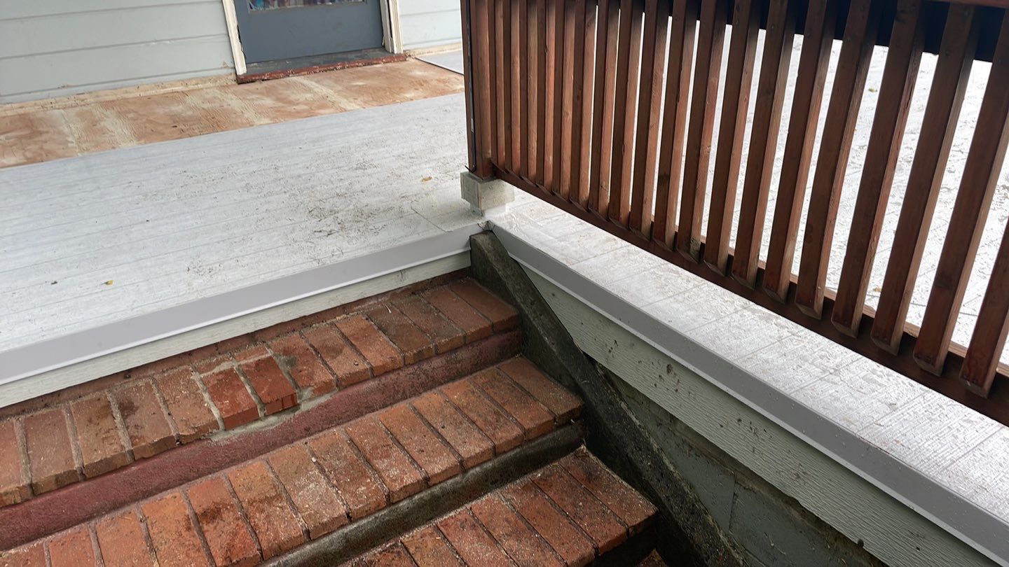 Residential Deck Replacement using Dec-Tec Membrane Color: Grafton by Orezona Building & Roofing Company, Inc.