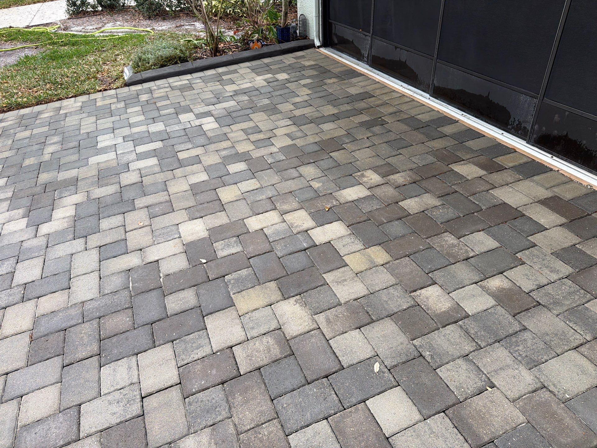 Professional Paver Sealing for Multi-Toned Driveway in Sun City Center by Supreme Paver Experts