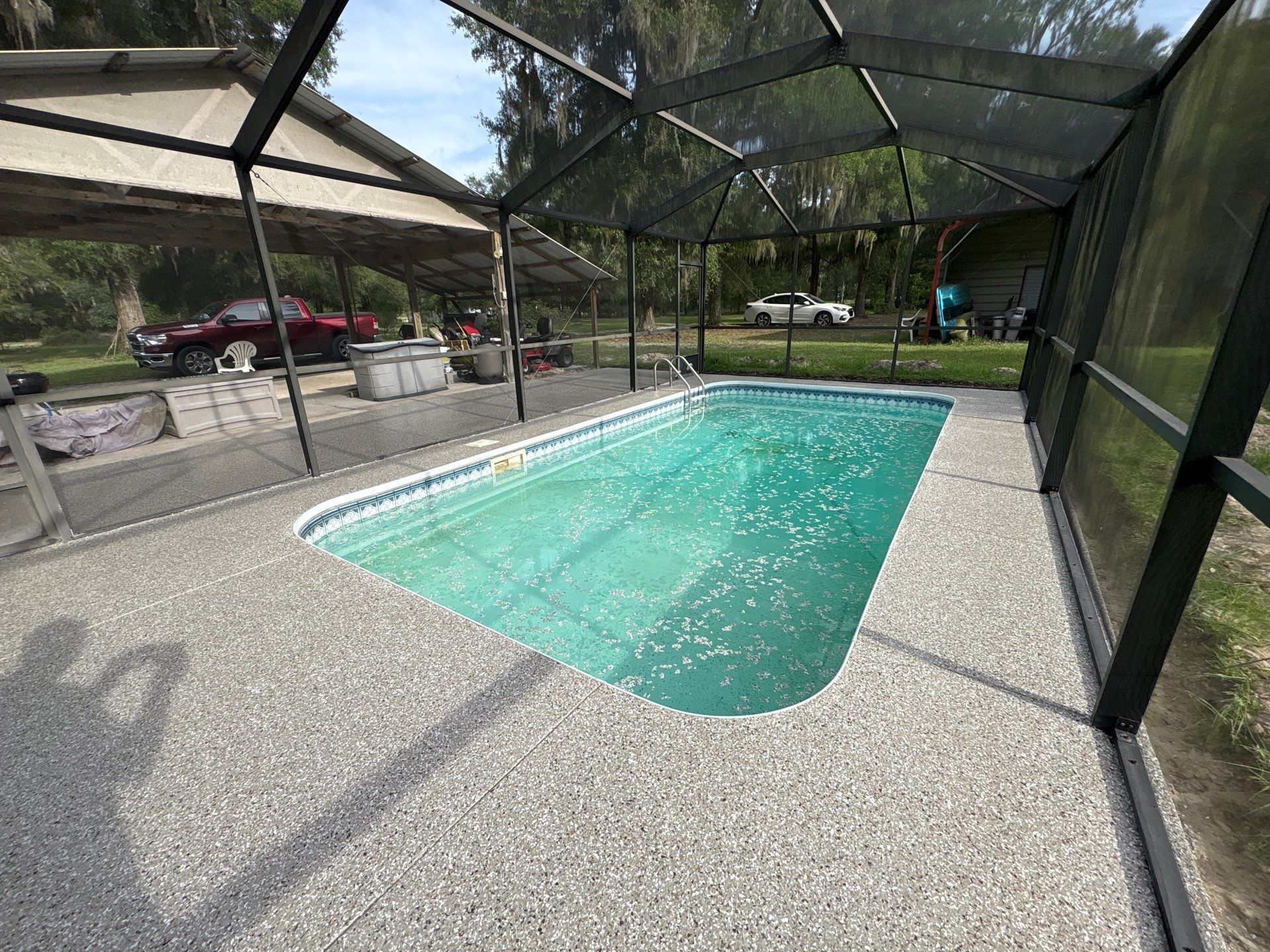 Pool Deck and Driveway in Pebble Beach by Cross Creek Concrete Coatings