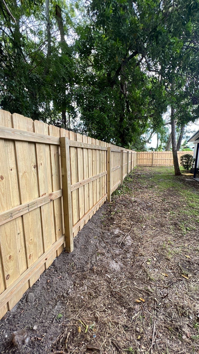 Wood Fence Installation using Board on Board Wood Fence by Asap fence and gates, LLC