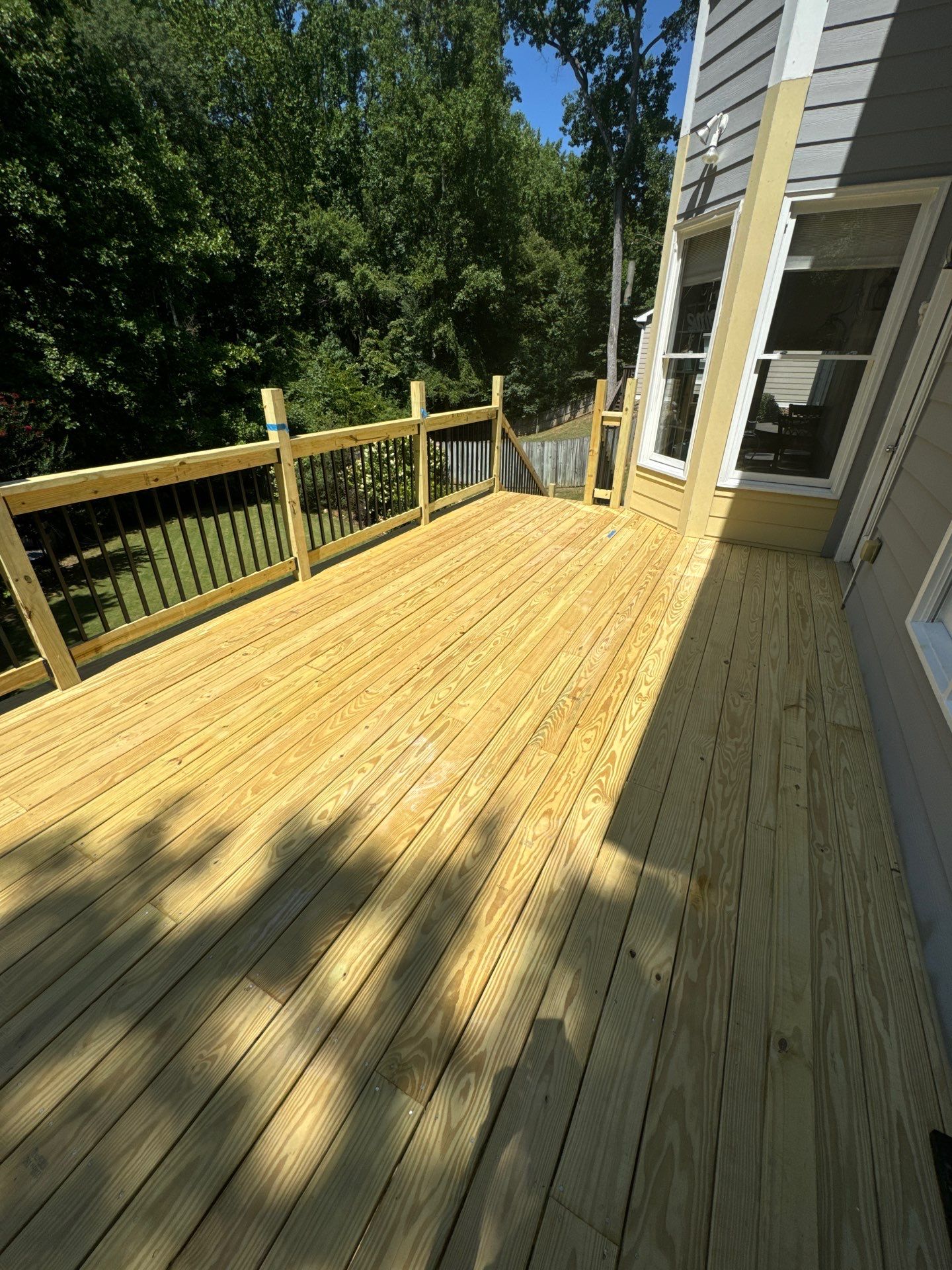 Pressure-Treated Wood Deck Replacement with Metal Balusters in Acworth by Swift Home Renovations