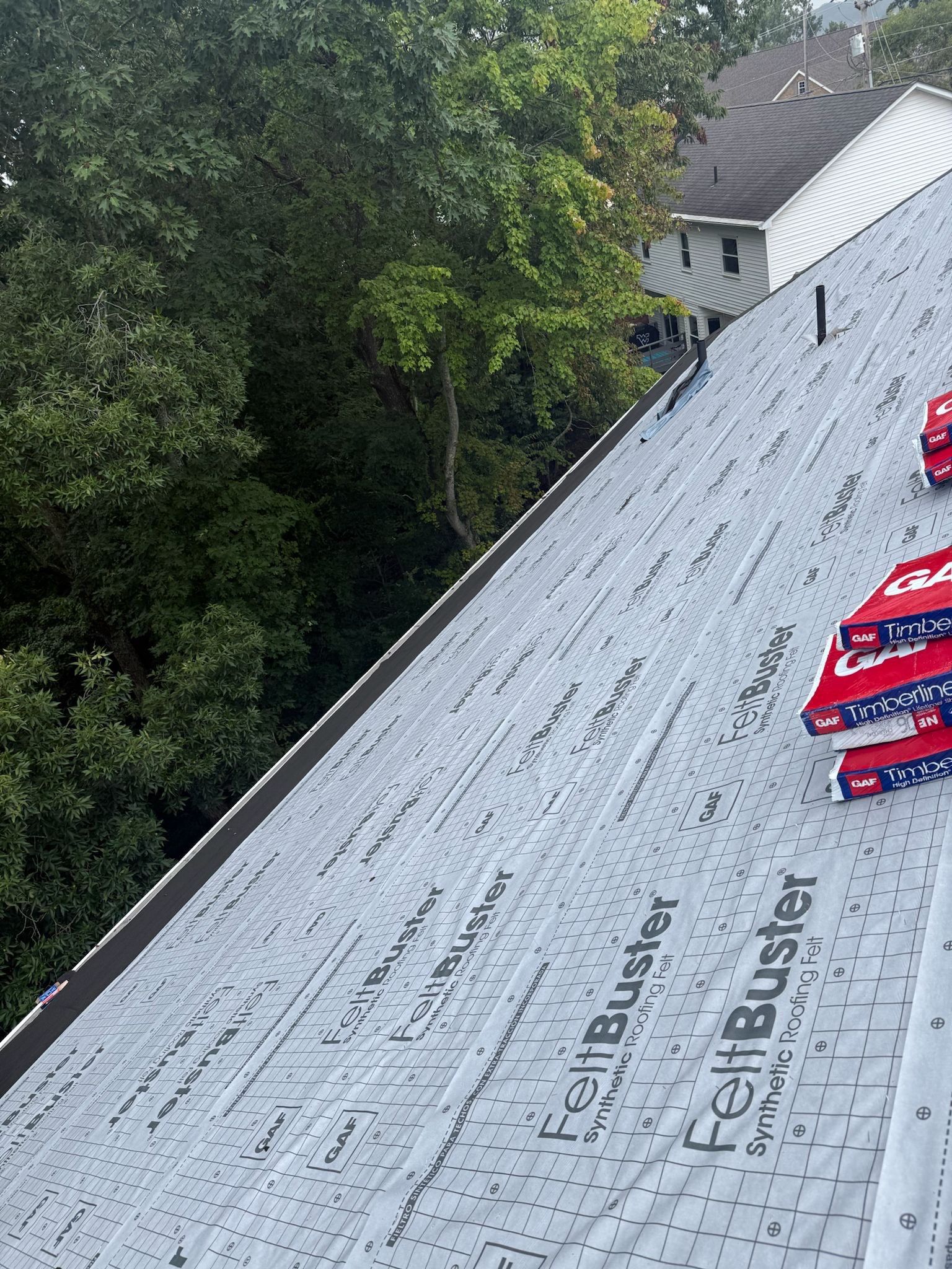 Residential Roofing Installation using GAF Timberline HDZ Charcoal by Rainstoppers Roofing