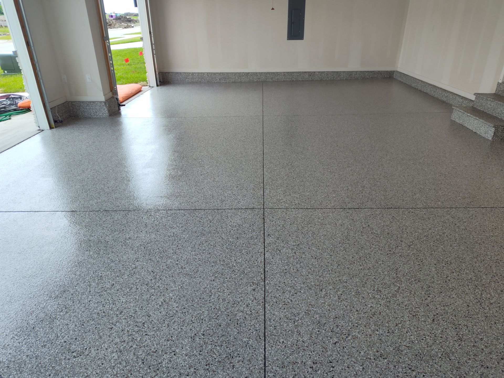 New Bondurant Garage Floor Coating by Revival Concrete Coatings, LLC