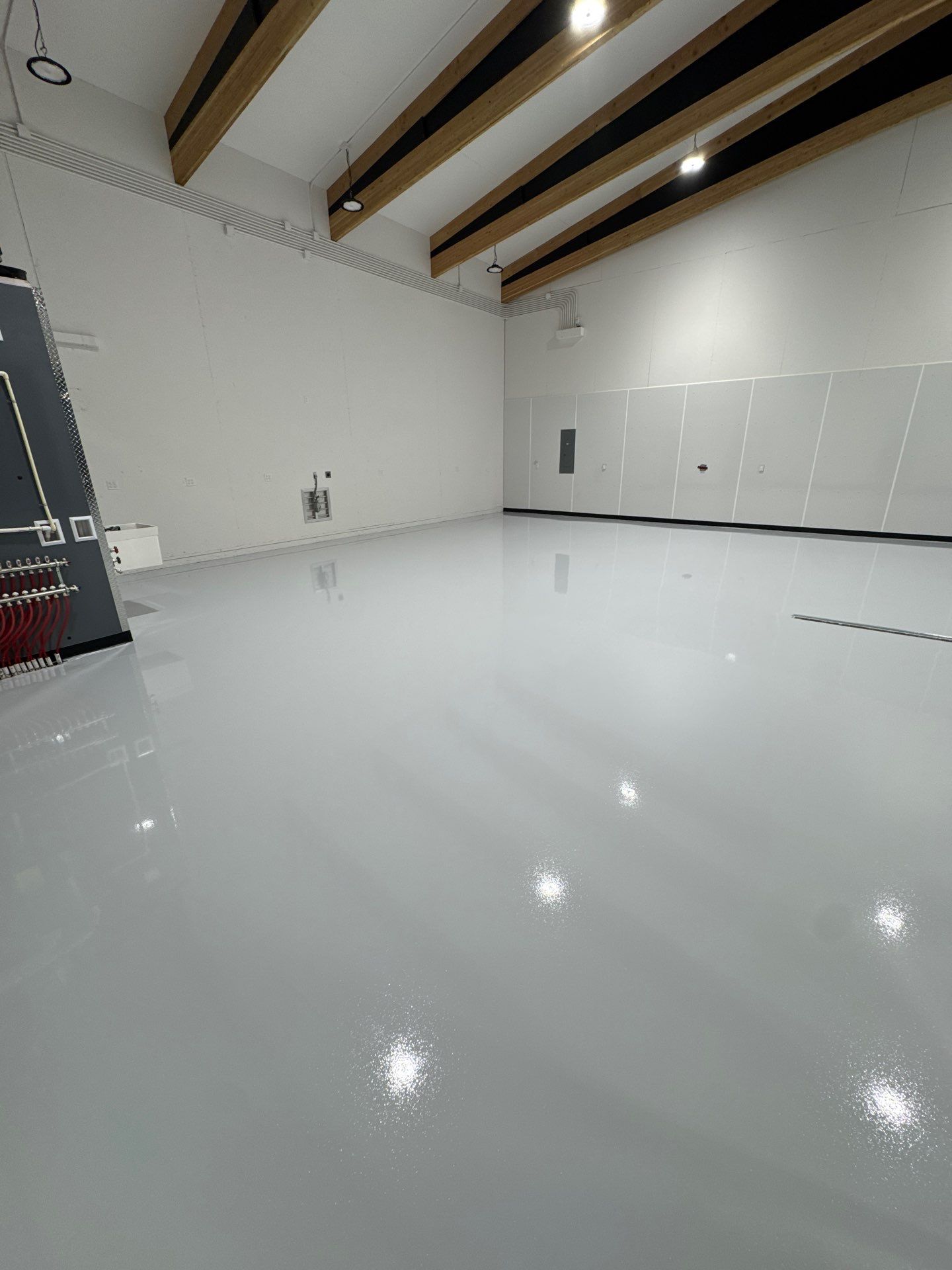 Colfax Commercial Shop Transformation With Vapor Mitigating Floor Coatings by Croc Coatings, LLC