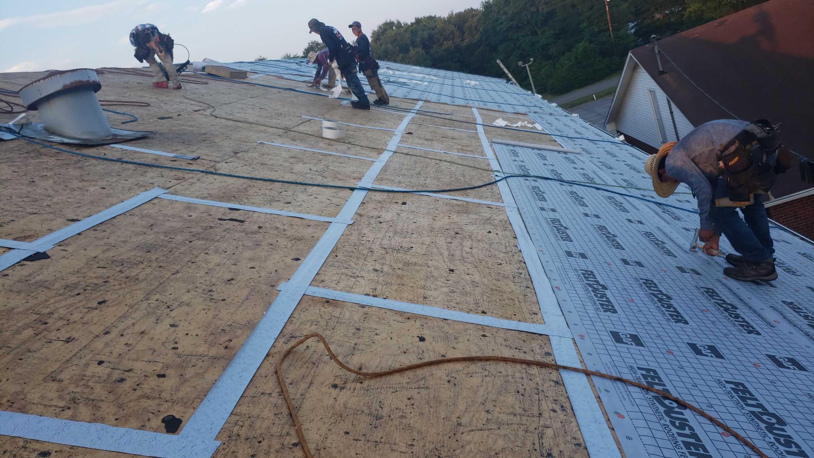 Residential Roofing Installation using Roof Replacement by American Roofing & Construction LLC