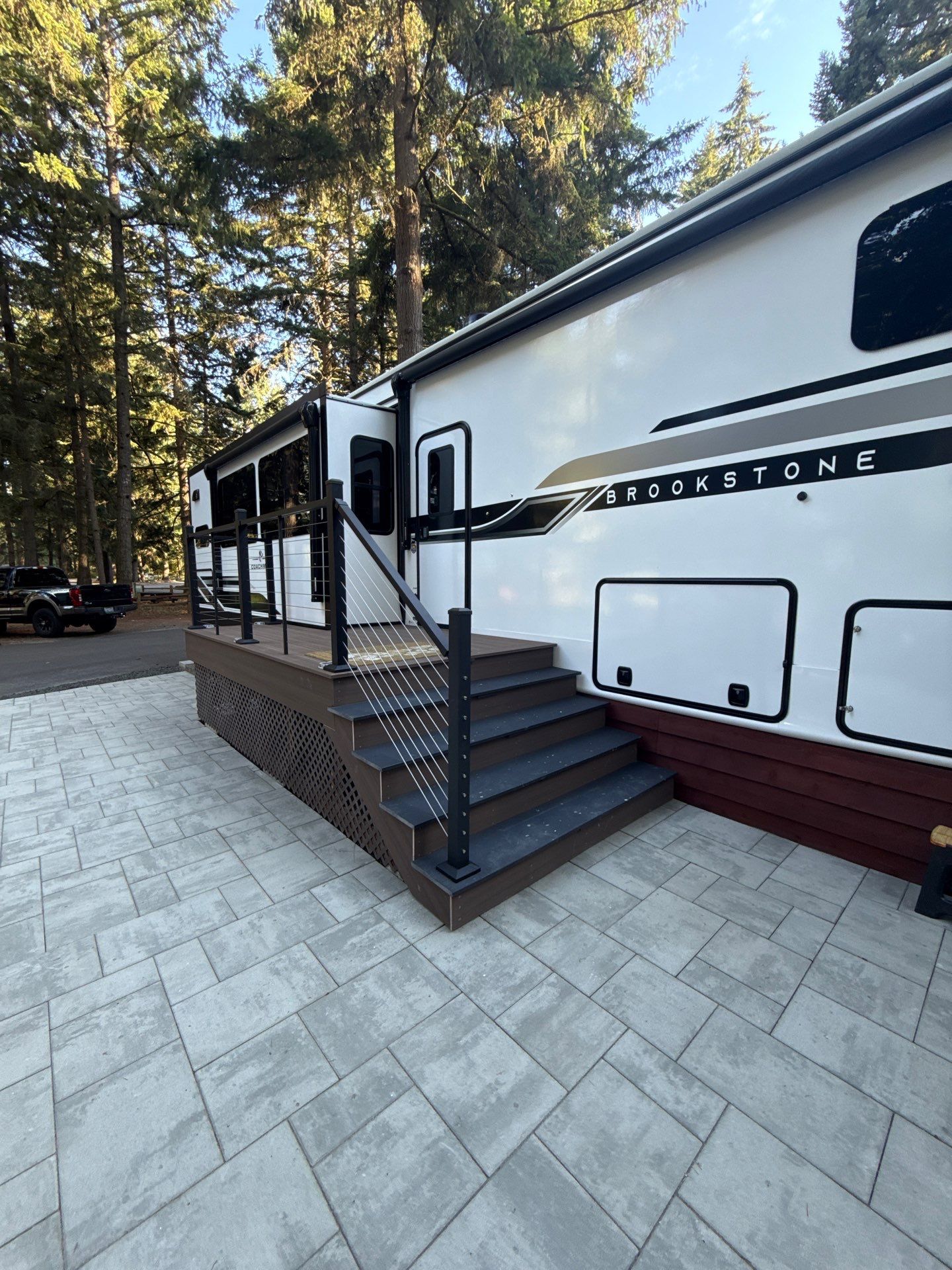 Custom Composite Deck with Cable Railing and Paver Patio in Olympia by Expedeck