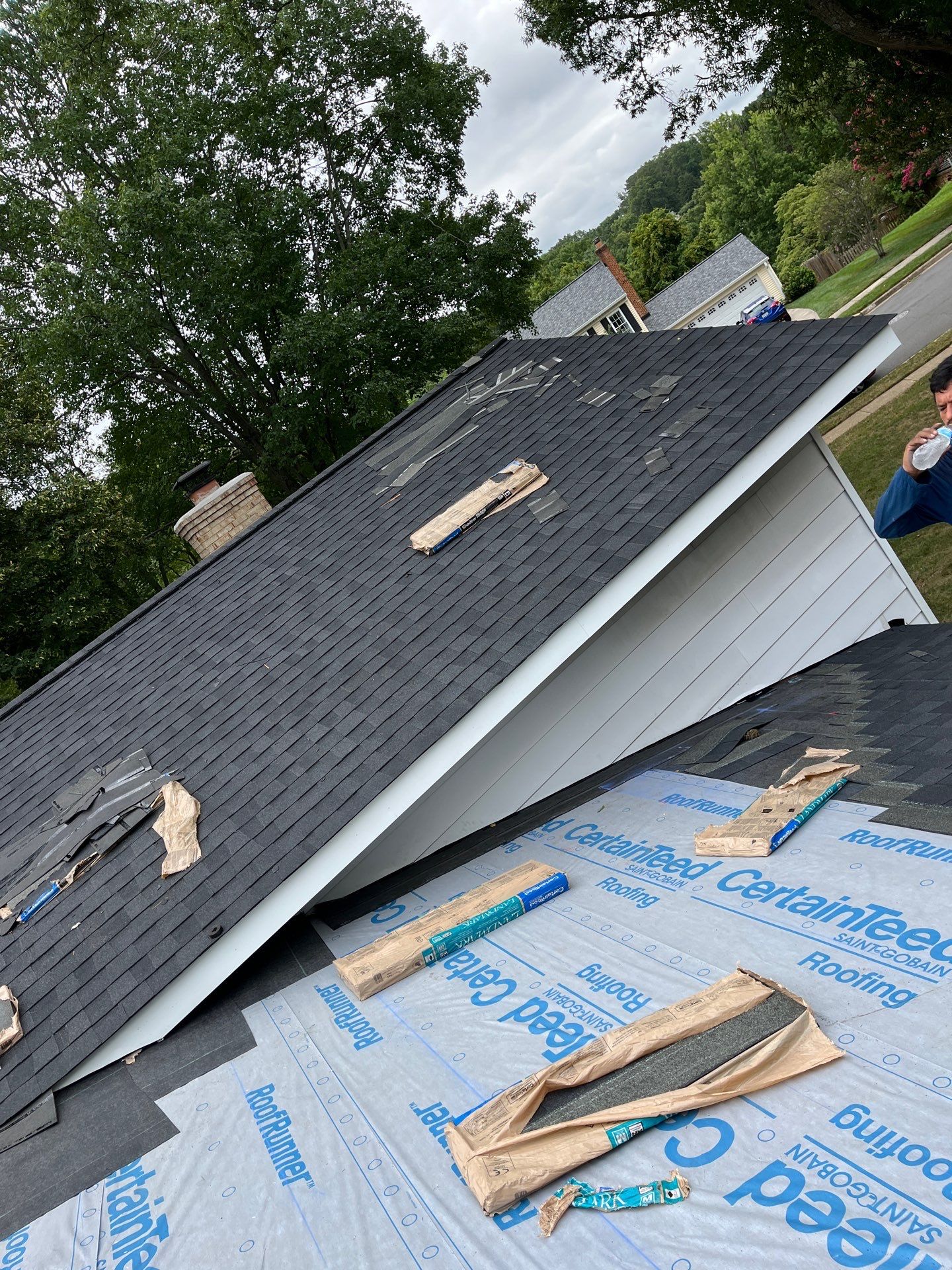 Vienna: Multi-Trade Restoration with CertainTeed Landmark Shingles in Charcoal Black by RM Banning, Inc.