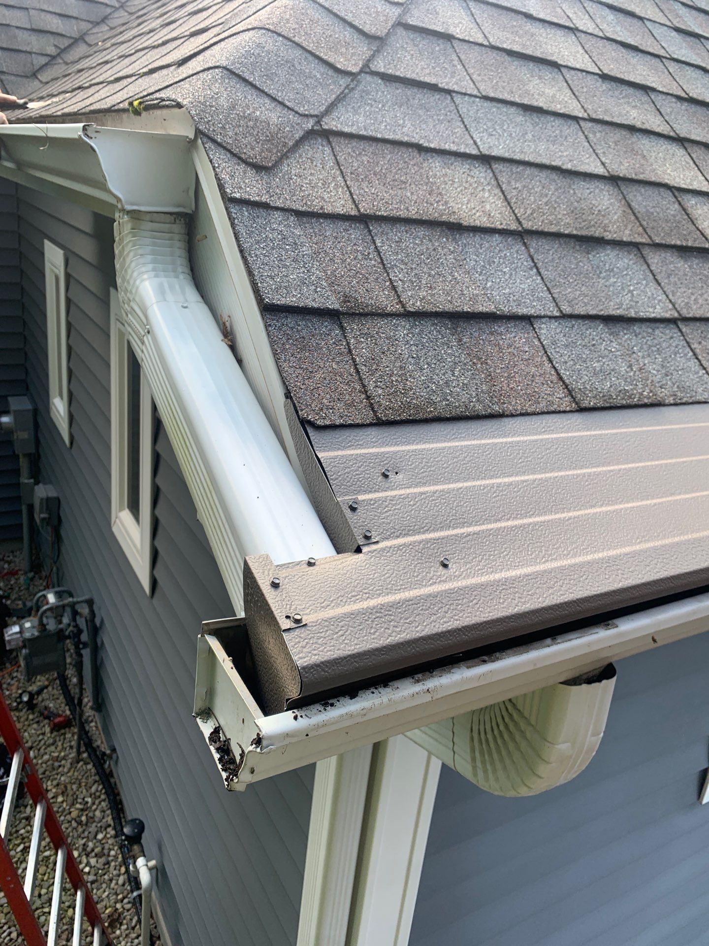 Gutter Helmet Protection System Installation for Traverse City Home by Rainbow Seamless Systems
