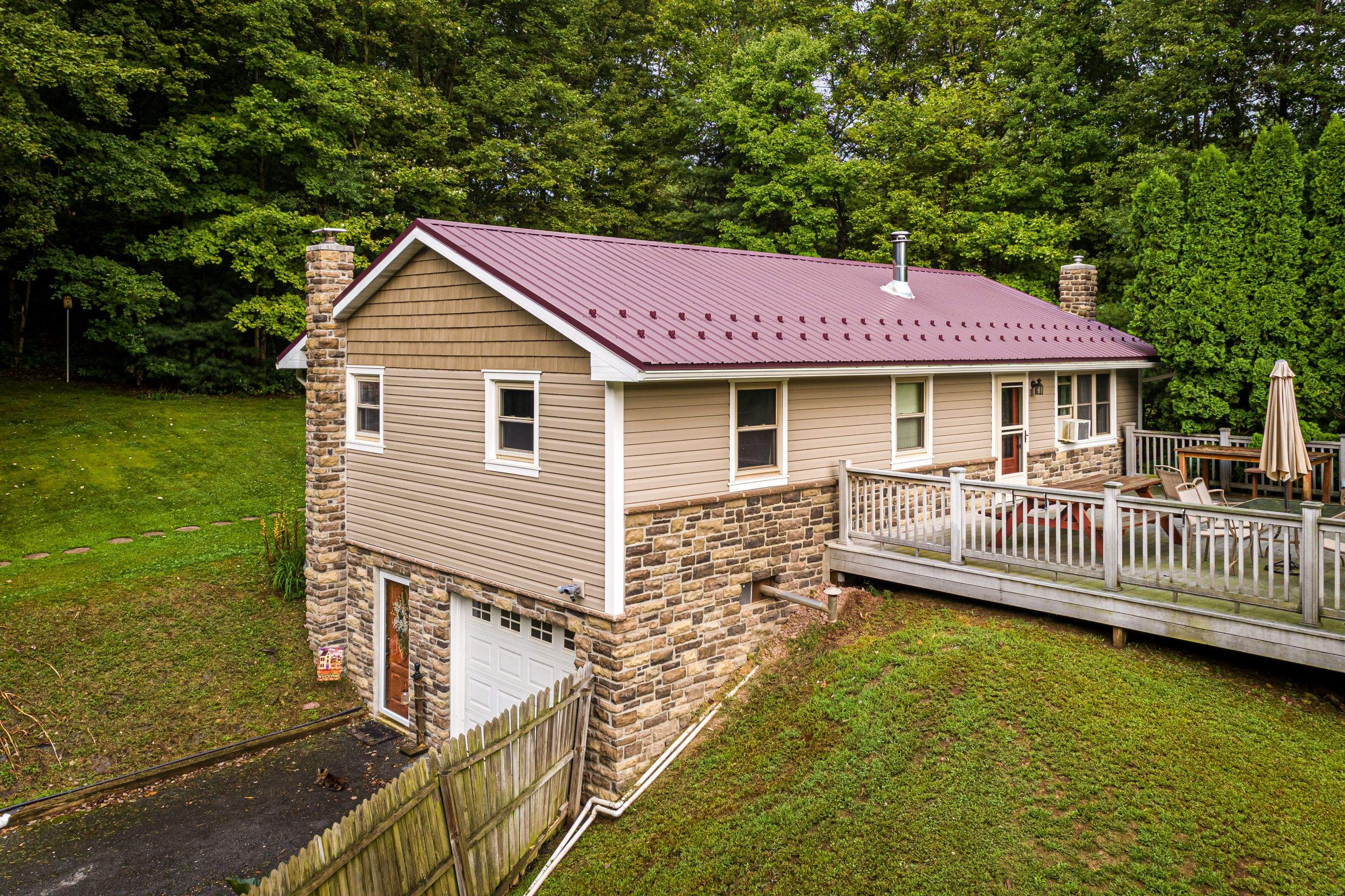 Vinyl Siding- by Esh Builders