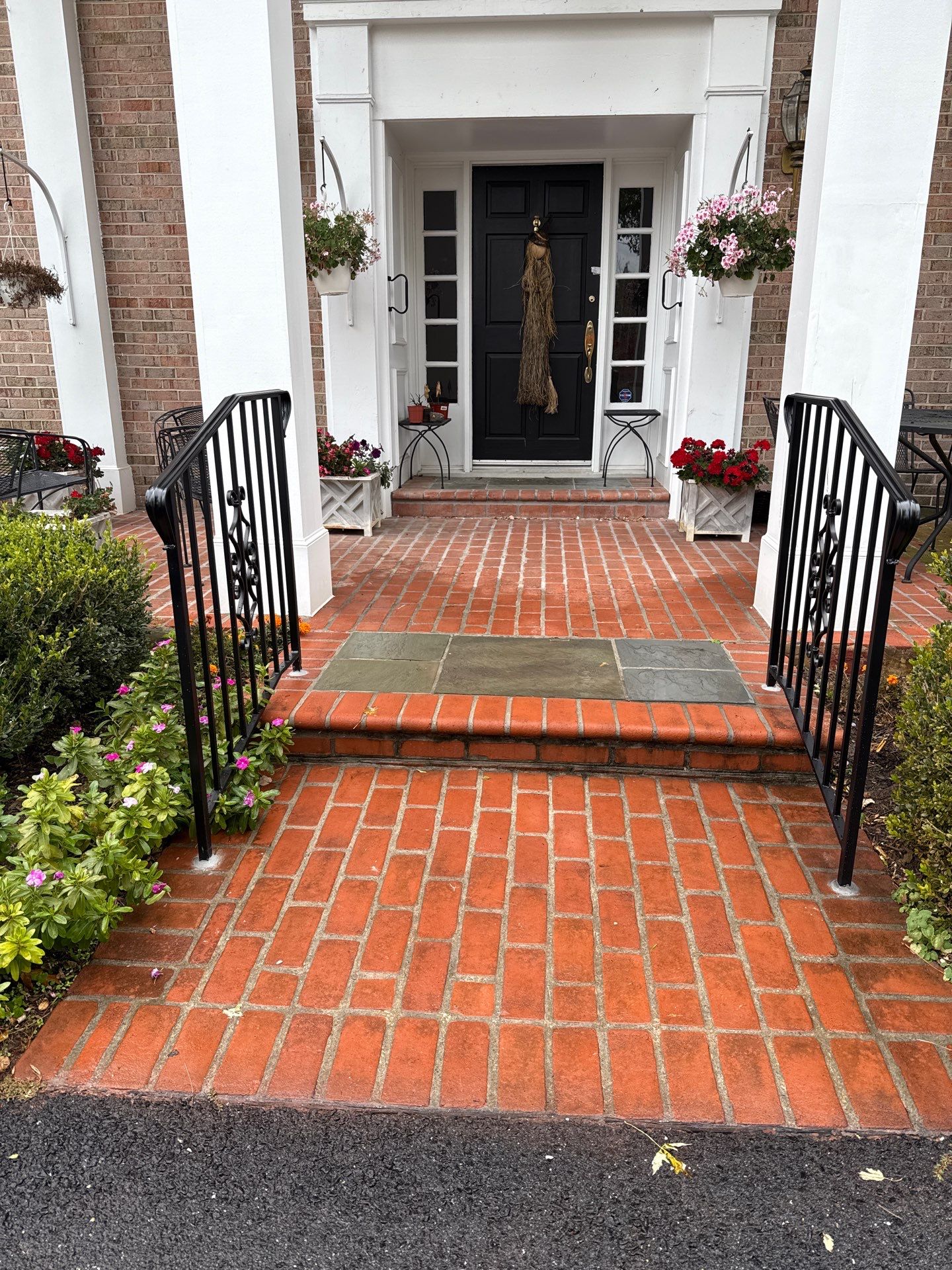 Wrought Iron Handrail Installation for Potomac Brick Entryway by Capitol Iron Works