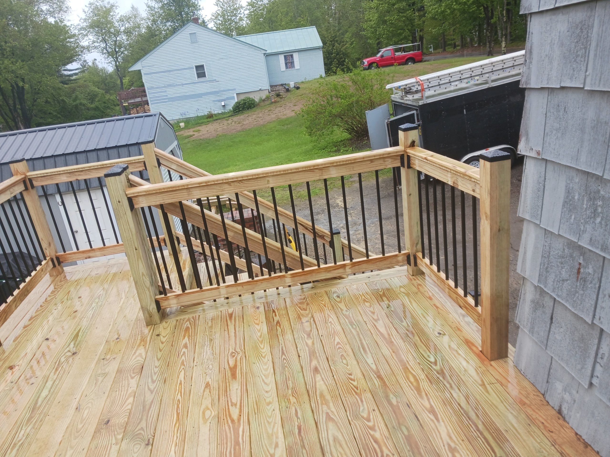 Moultonborough, NH – Pressure-Treated Deck Installation by Tall pine roofing