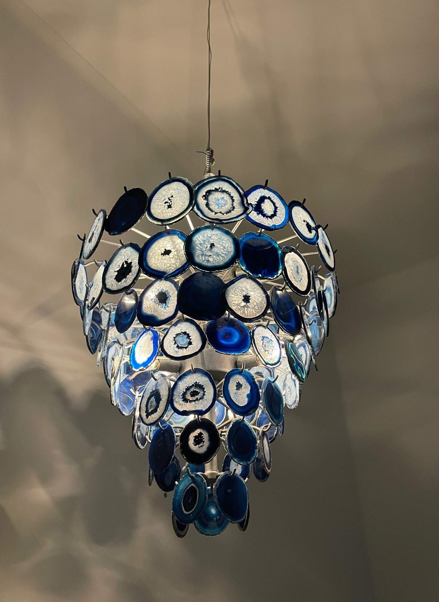 Custom Agate Chandelier and Sconce Lighting Installation by Solara Custom Living