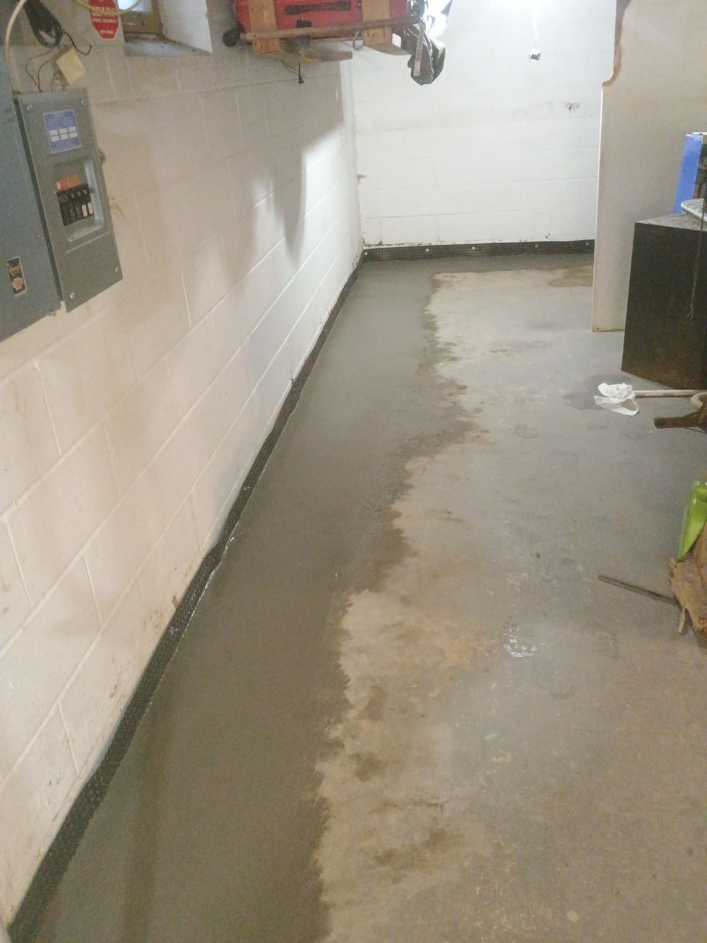Interior Drain Tile Installation in Columbia Heights, MN by Waterproofing Northeast