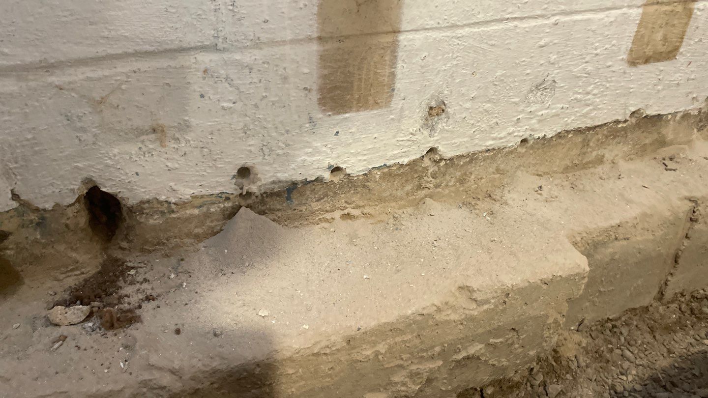 Interior Drain Tile & Buried Discharge in St. Anthony, MN by Waterproofing Northeast