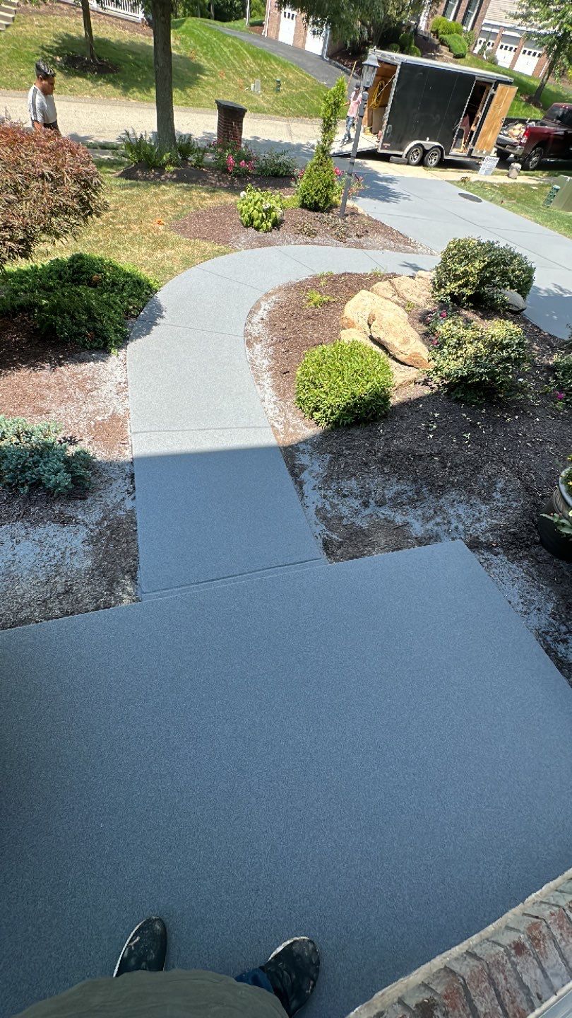 Pool Deck + Driveway + Garage Project in Venetia by Floors in a Day, Inc