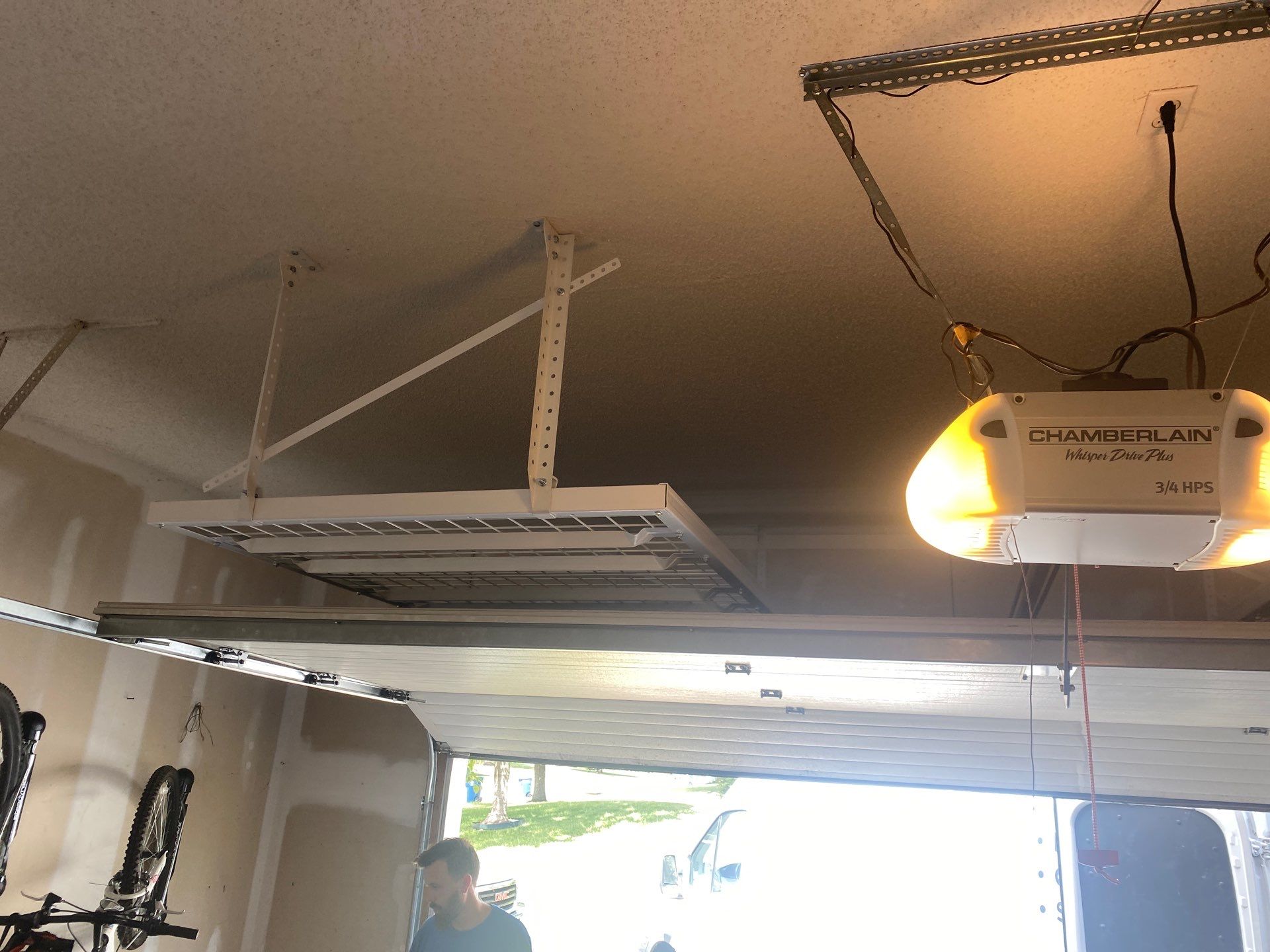 Michael J. adds wall storage and ceiling rack to his garage! by Banner Garage