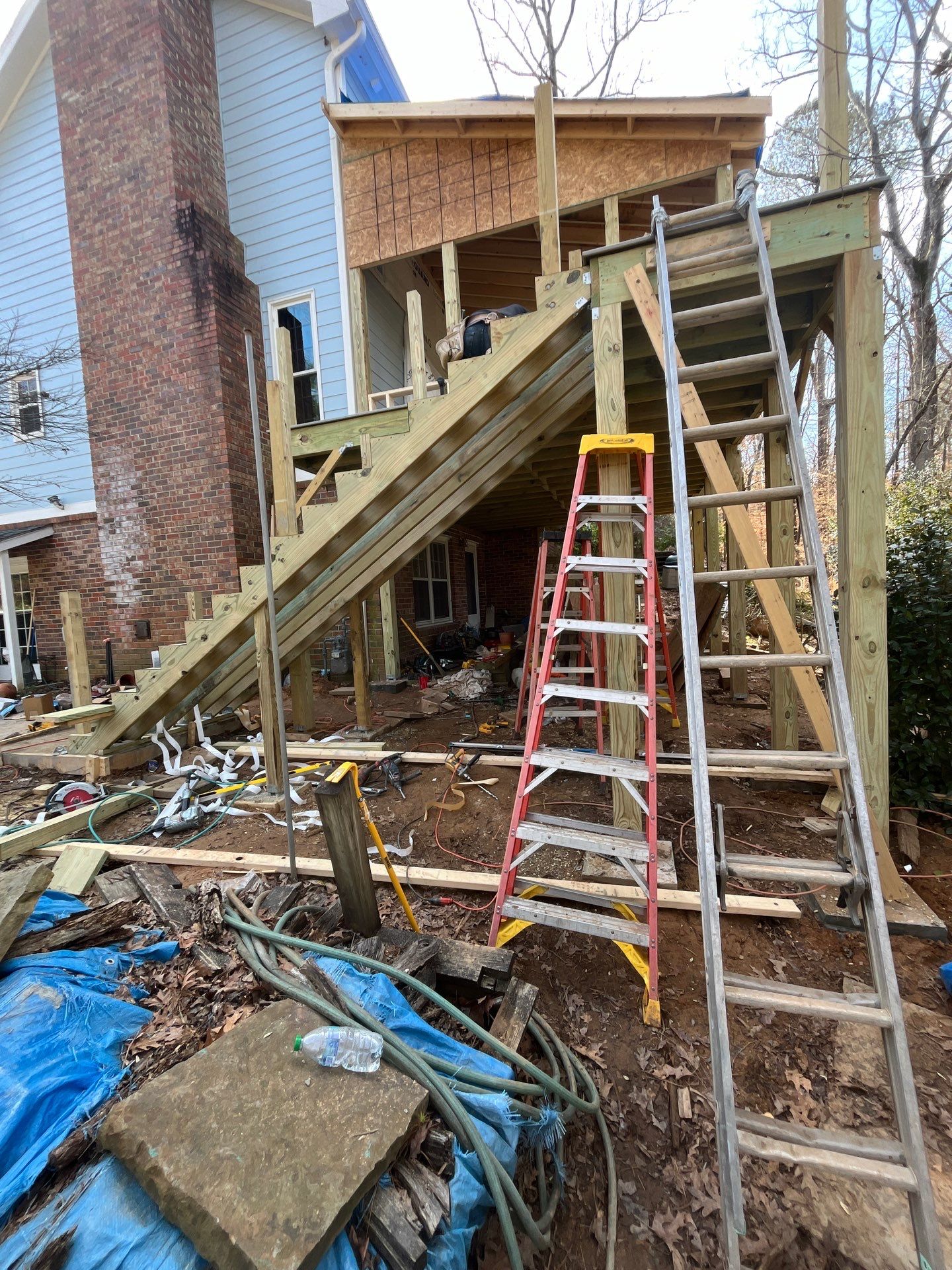 New deck with screened in porch by Nelson Exteriors 