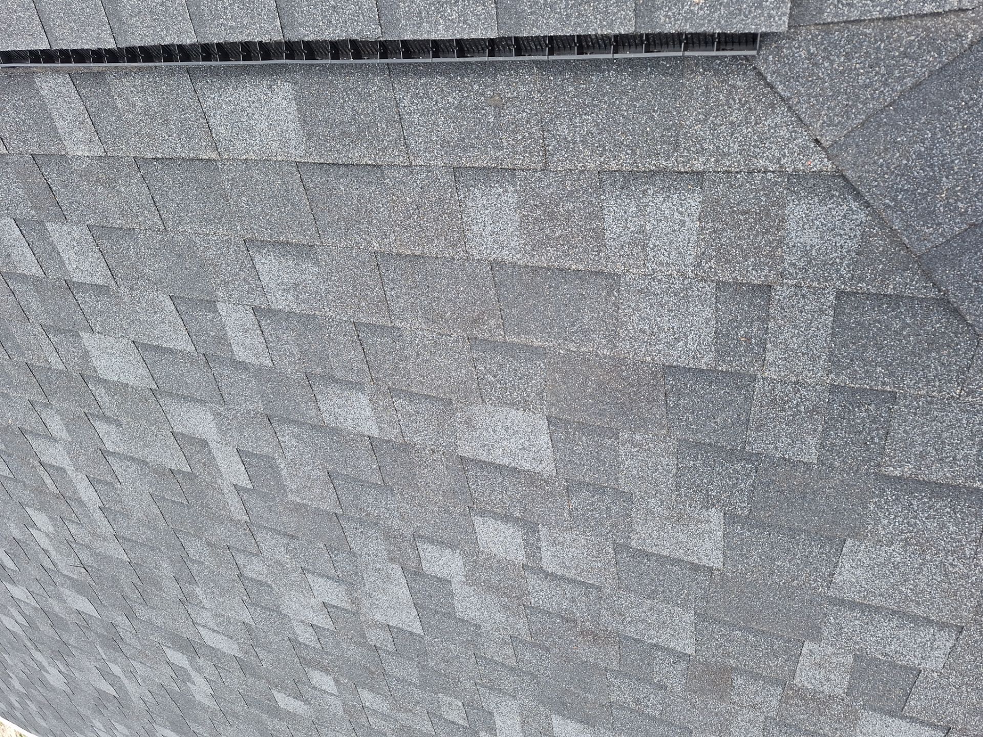 Estate Gray Shingles by Reimagine Roofing