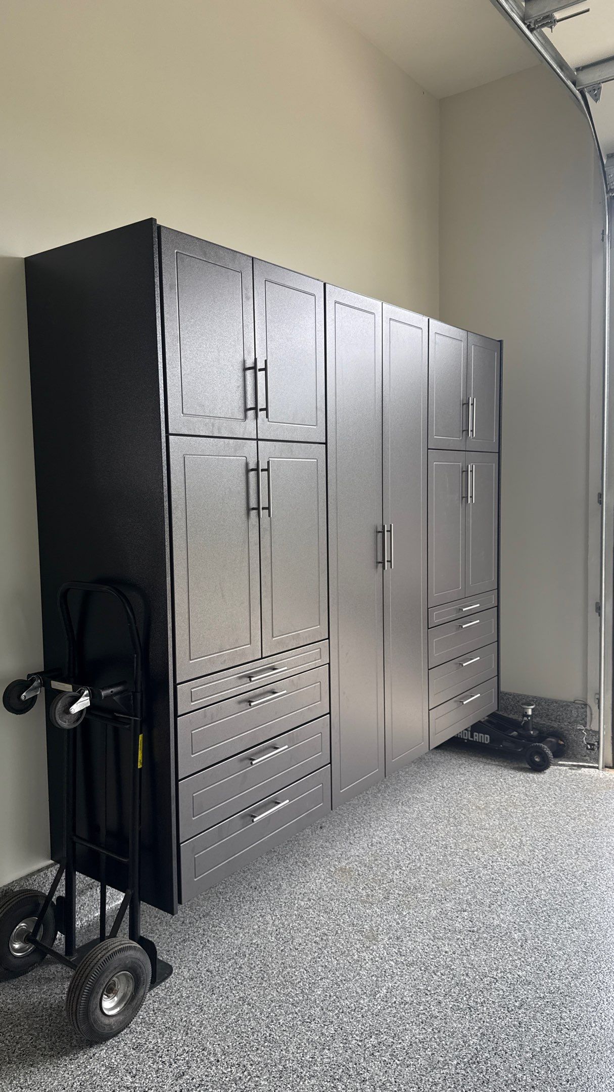 Mark Added Storage Plus A Motorized Lift  by Banner Garage