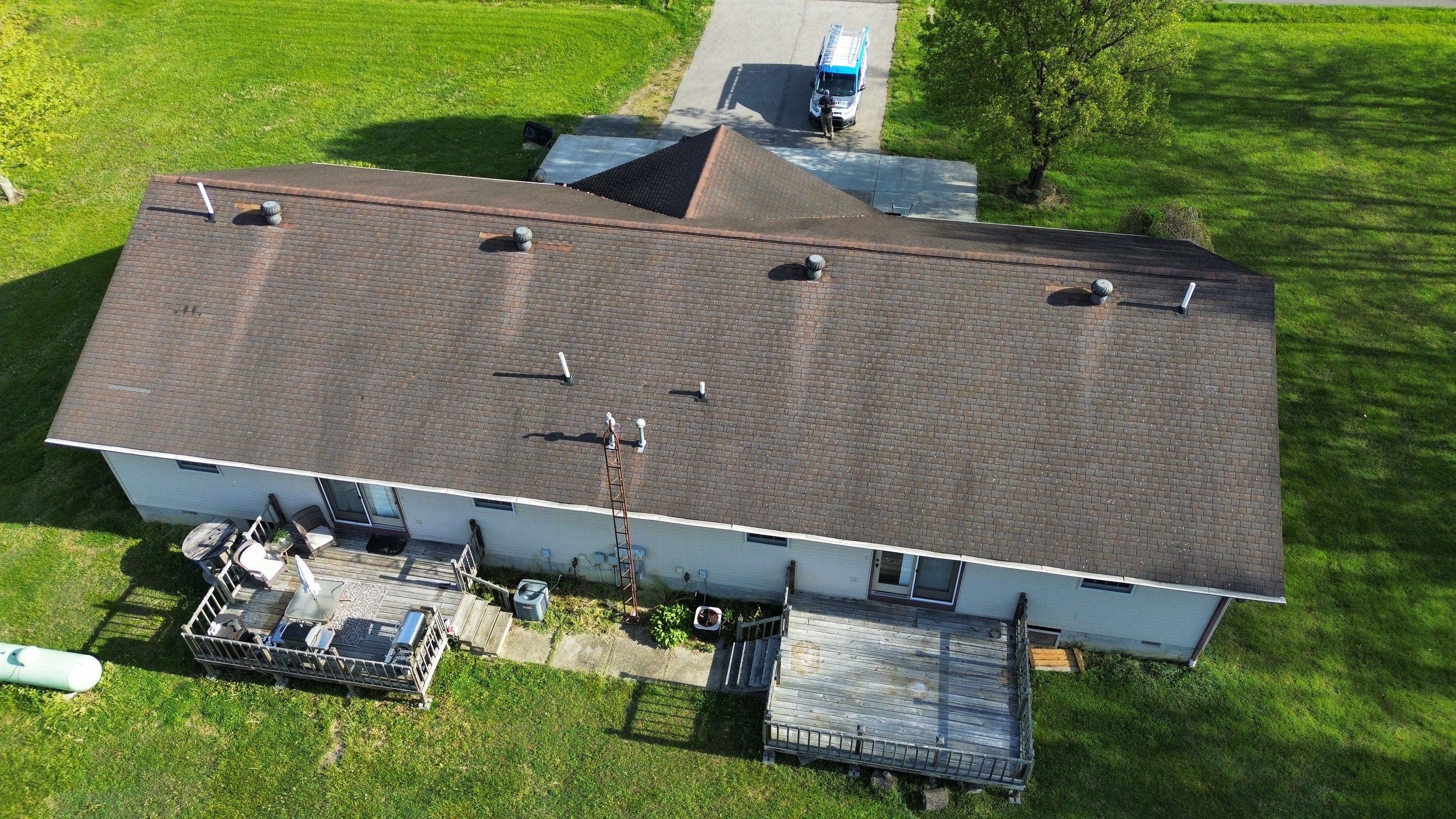 Residential Roofing Installation using Performance Panel Metal - Coca Brown by RoofX 