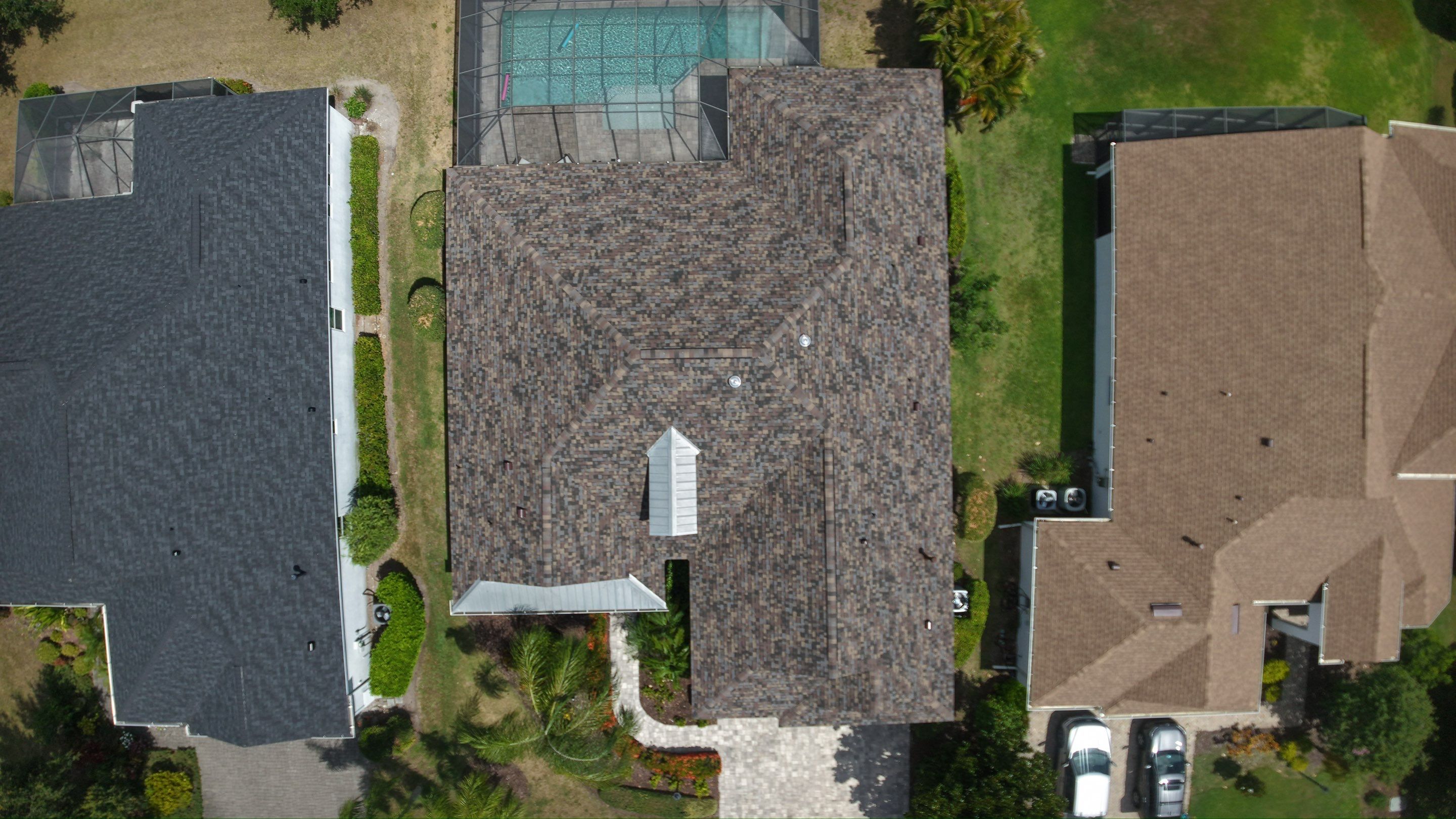 Architectural Summer Harvest Asphalt Shingle Roof Replacement in Bradenton, Florida by Trinity Restoration and Roofing LLC