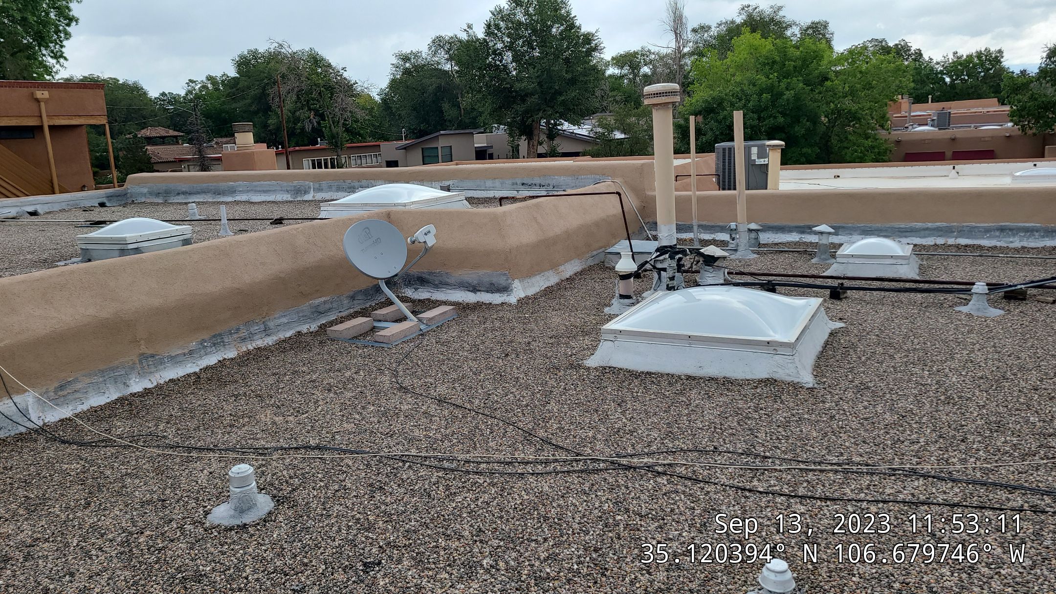 Roof Maintenance and Low-E Tempered Glass Skylight Replacement on Gravel Roof in Northwest Albuquerque by Doyle Roof Masters Inc