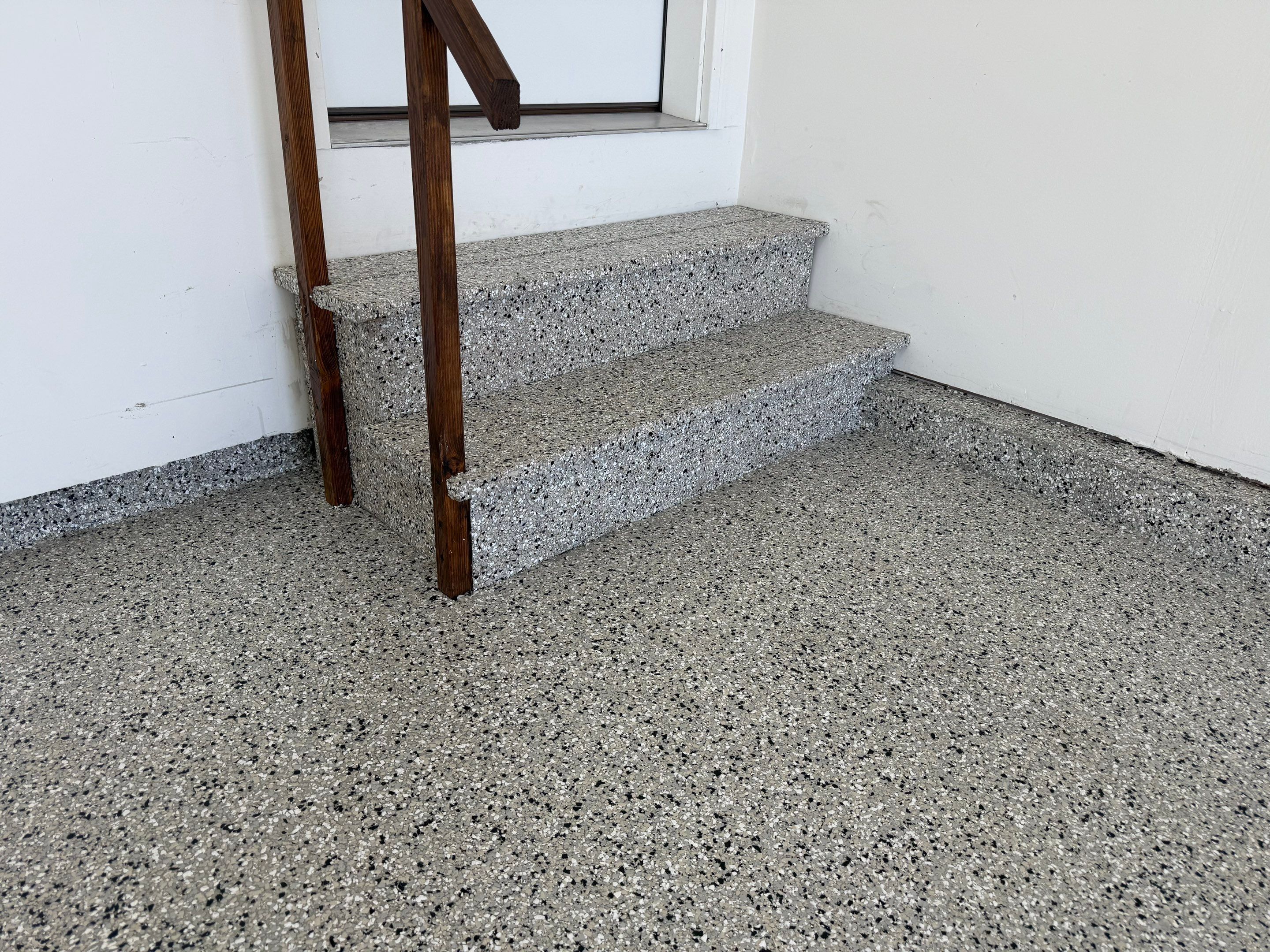 Cabin Fever Garage Floor Coating in Sioux Falls by Select Painting, Coatings & Garage Cabinets