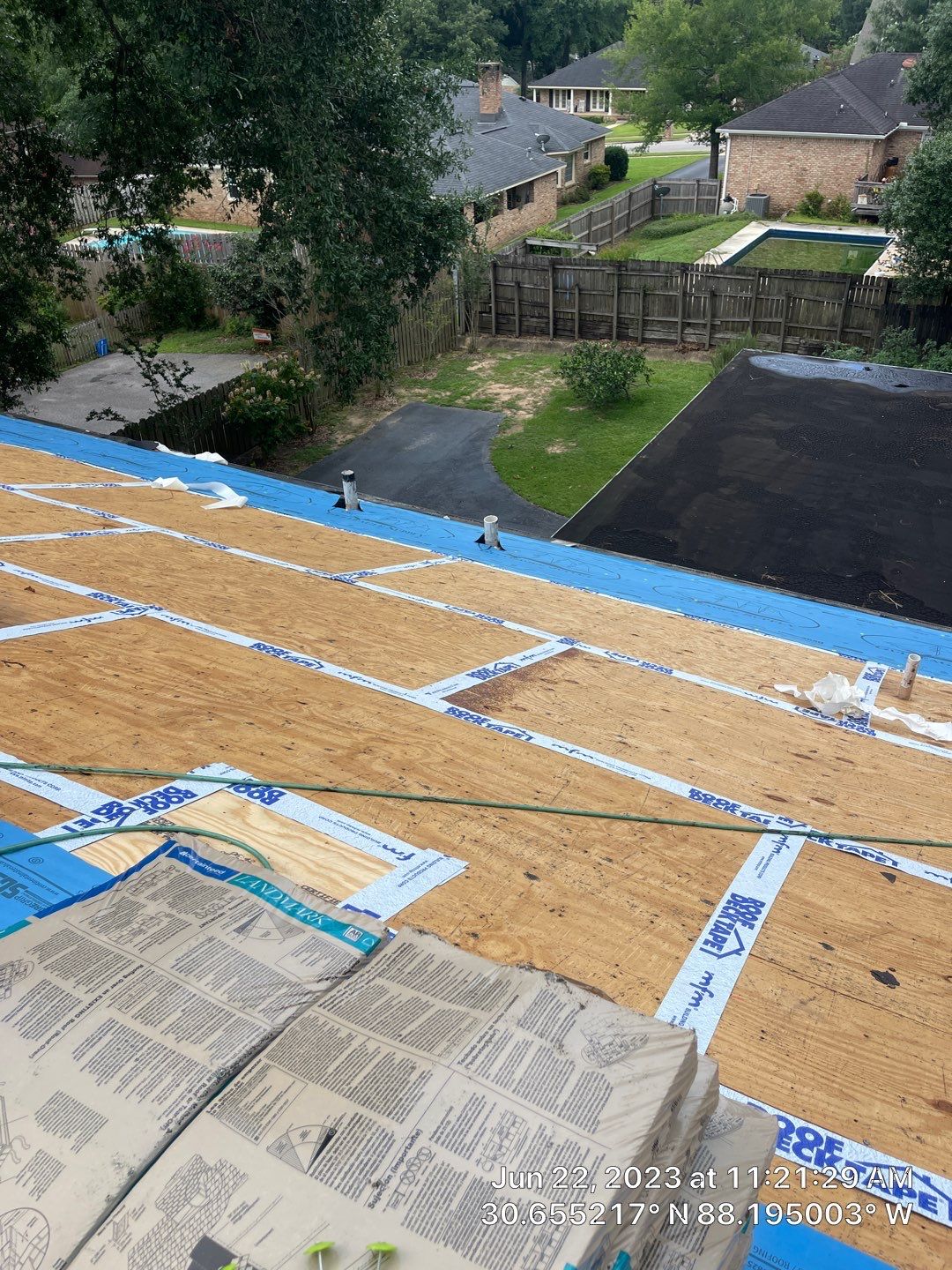 Residential Roofing Installation using Roof Replacement by American Roofing & Construction LLC