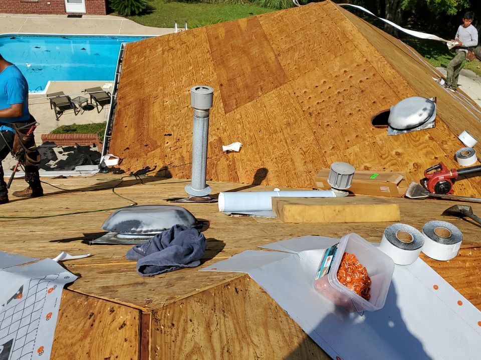 Residential Roofing Installation using Roof Replacement by American Roofing & Construction LLC