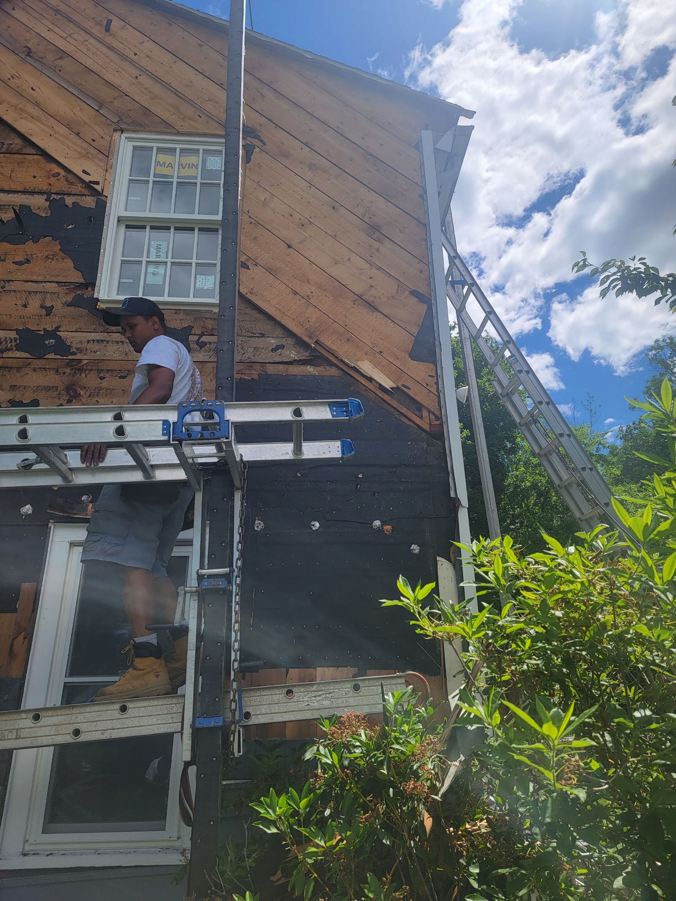 Siding Installation using James Hardie. New ThermaTru entry door and Marvin windows by UBrothers Construction