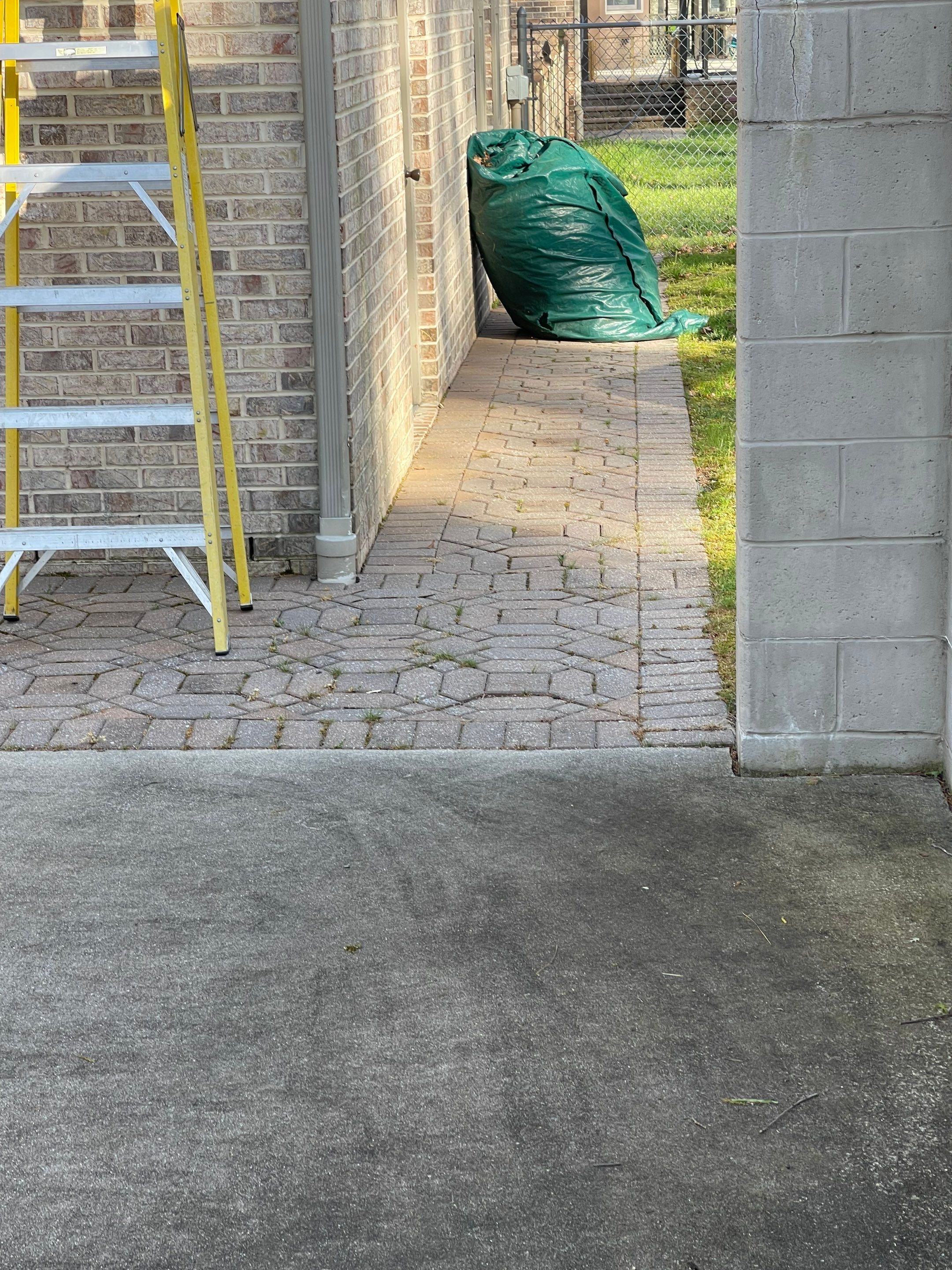 Pavers Cleaned, Garage and Concrete walls by SJ Exterior