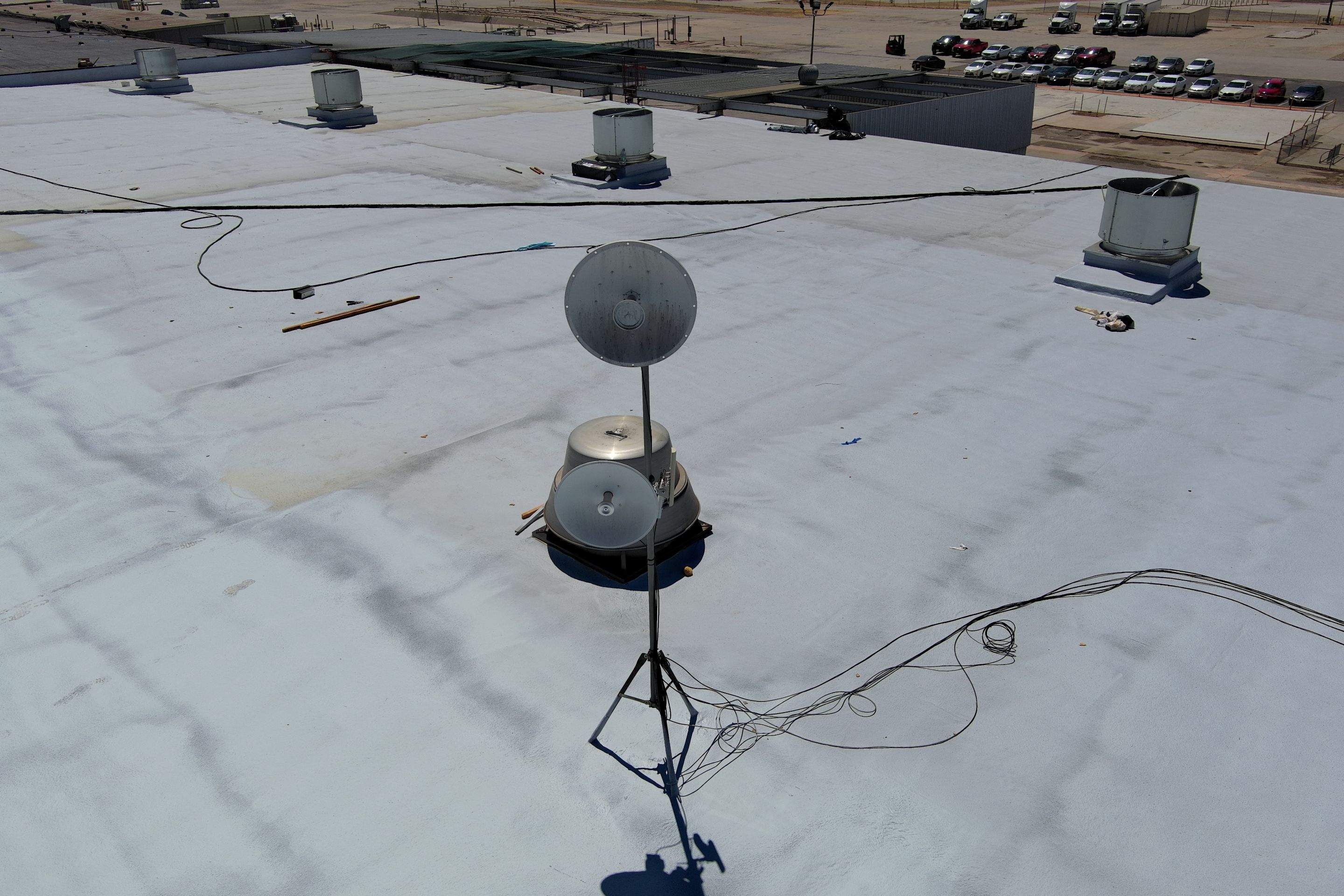 Pro Farms Spray foam roofing project by Straight Edge Roofing Inc