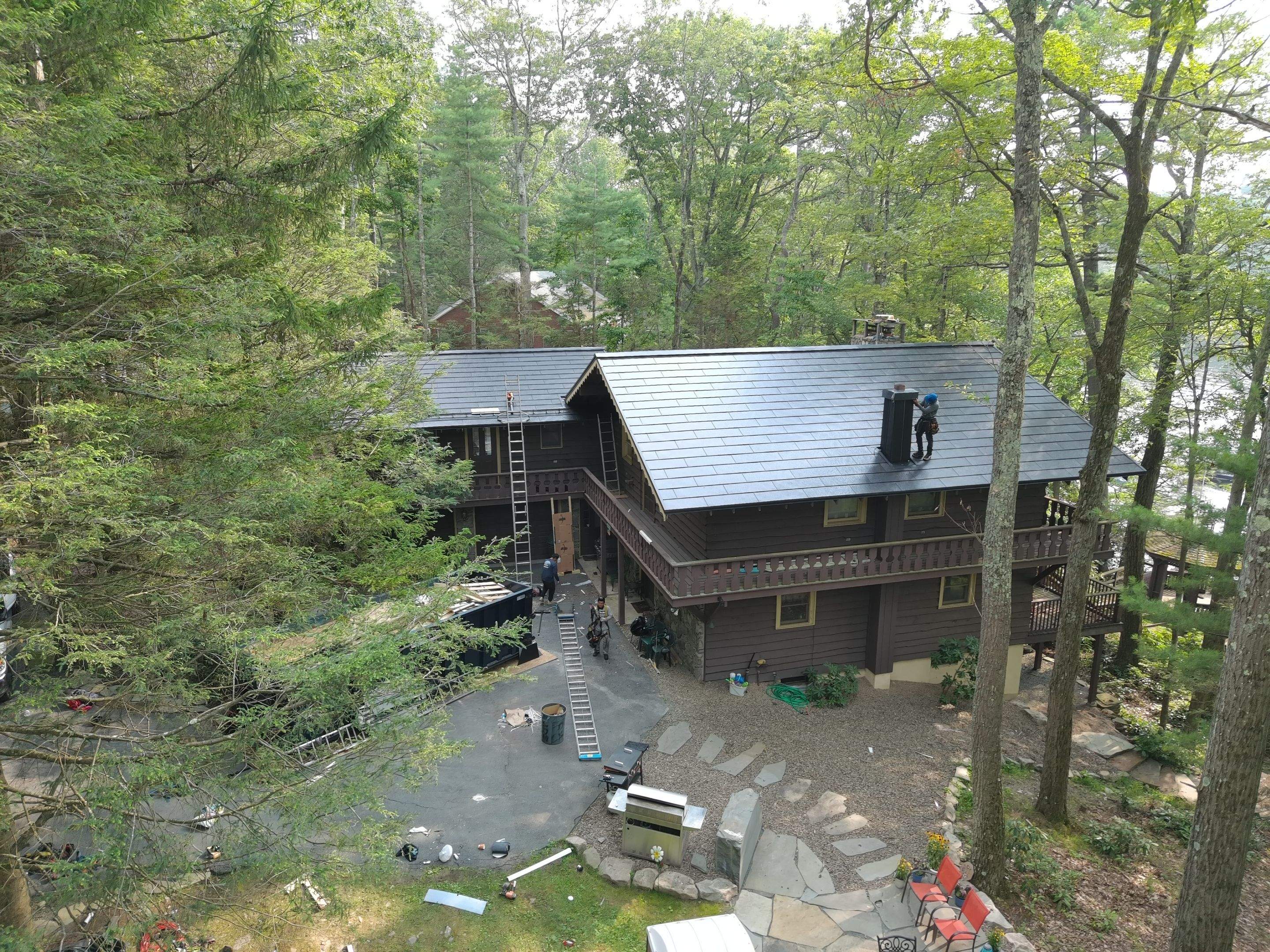 Stunning Tesla Solar Roof Cabin in the Woods by American Home Contractors