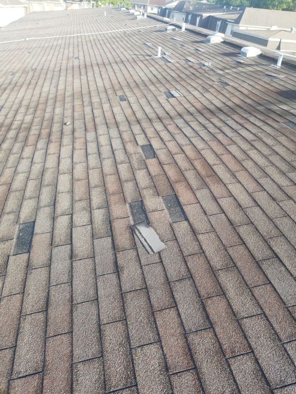 Residential Roofing Repair using Roof Replacement by American Roofing & Construction LLC