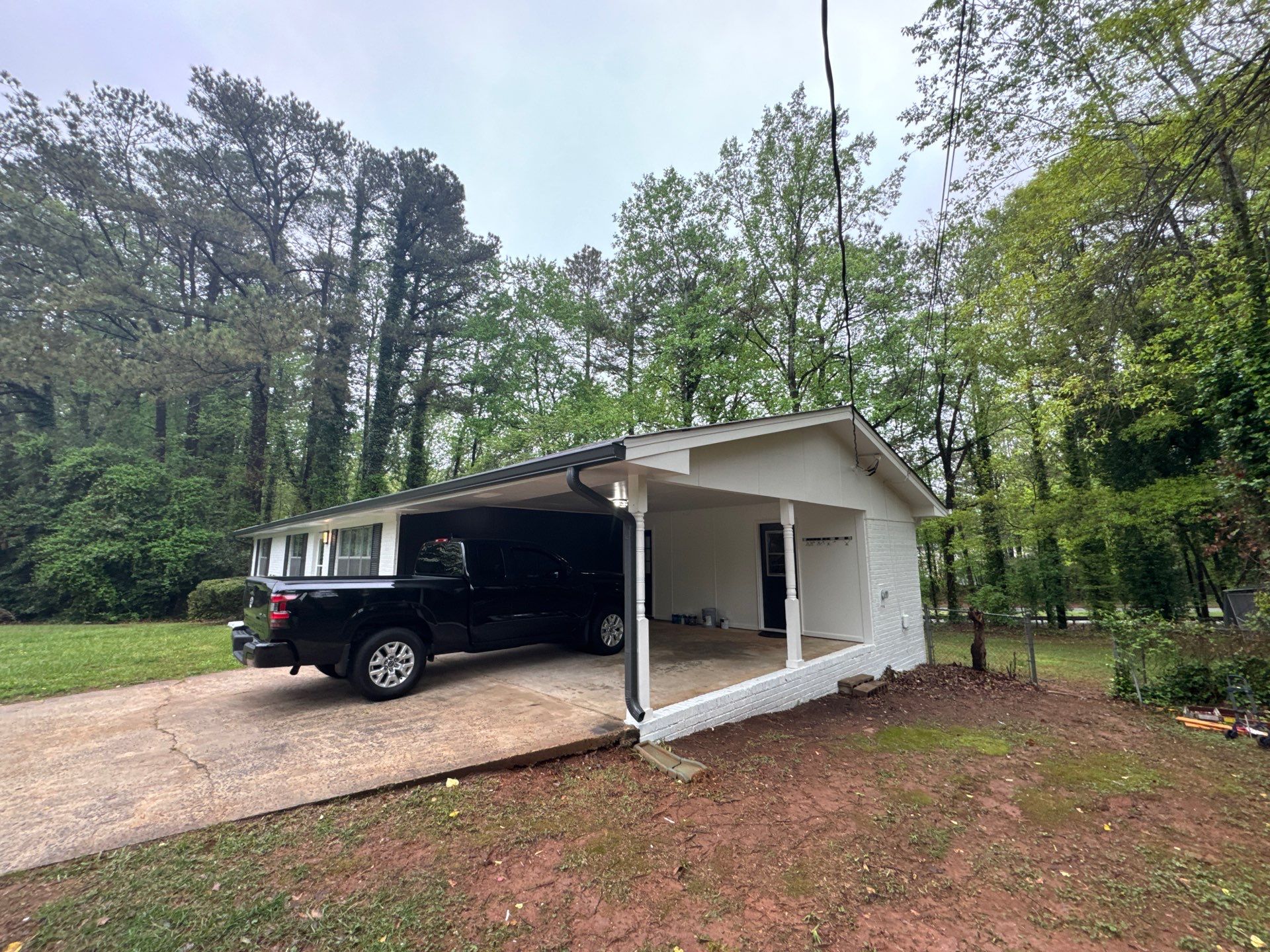 White Brick Exterior Painting and Shutter Refresh in Marietta by Swift Home Renovations