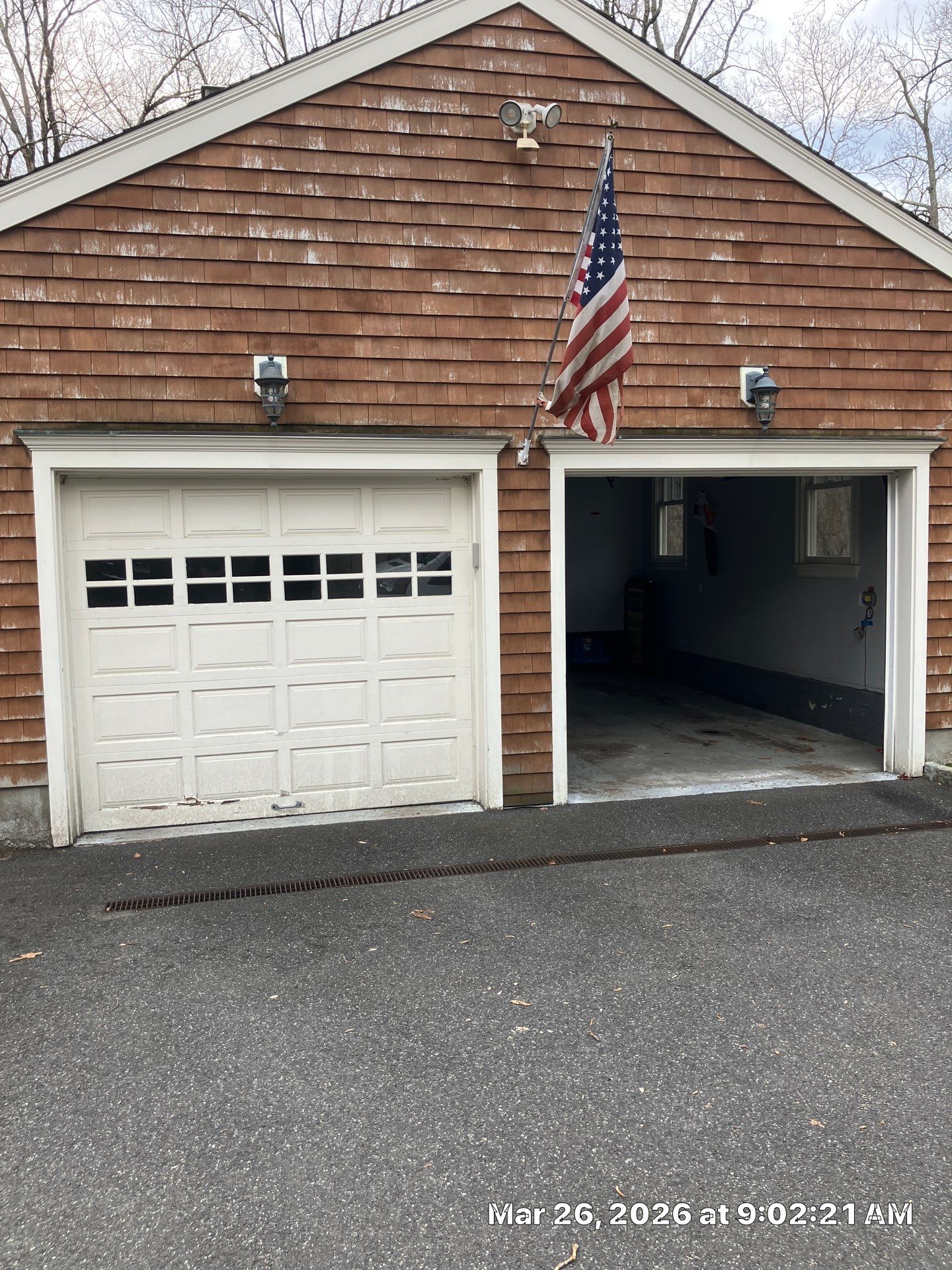 Classic Curb Appeal with an Amarr Carriage Court Garage Door by DiGiorgi Roofing and Siding Inc