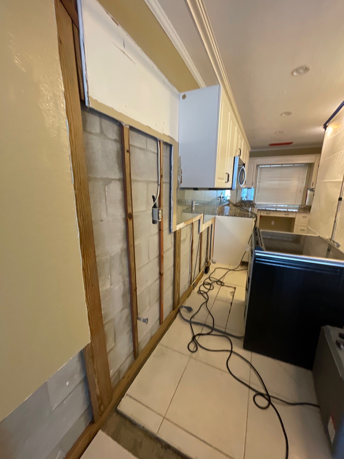 Mold remediation and rebuild of kitchen and living areas by Bay Coast Restoration 