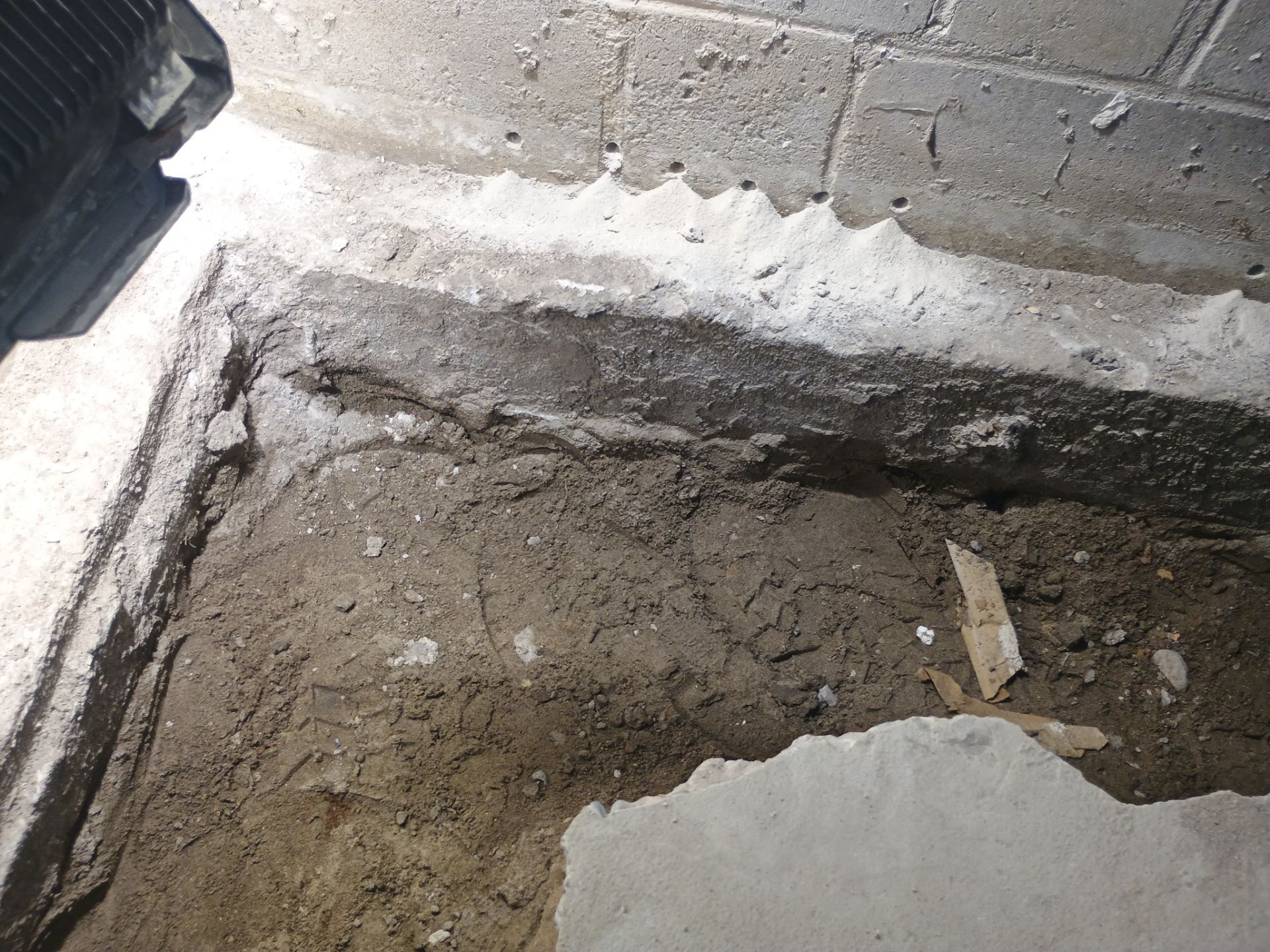 Interior Drain Tile & Buried Discharge in South Minneapolis by Waterproofing Northeast