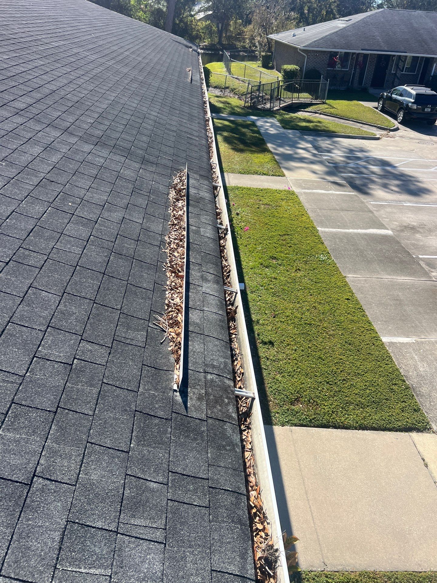 HOA gutter cleaning before photo