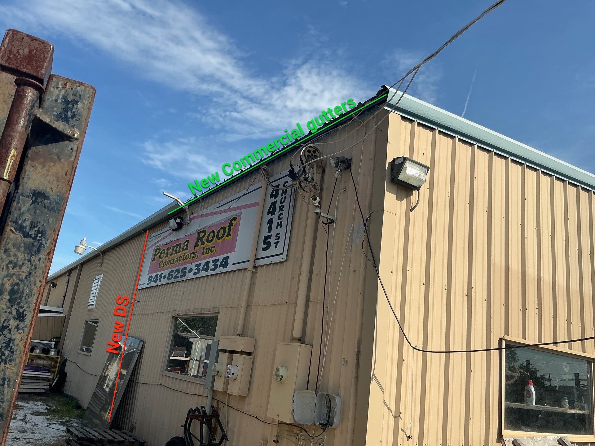 Black Aluminum Gutters with Matching Downspouts in Port Charlotte, FL by Gutter Professors