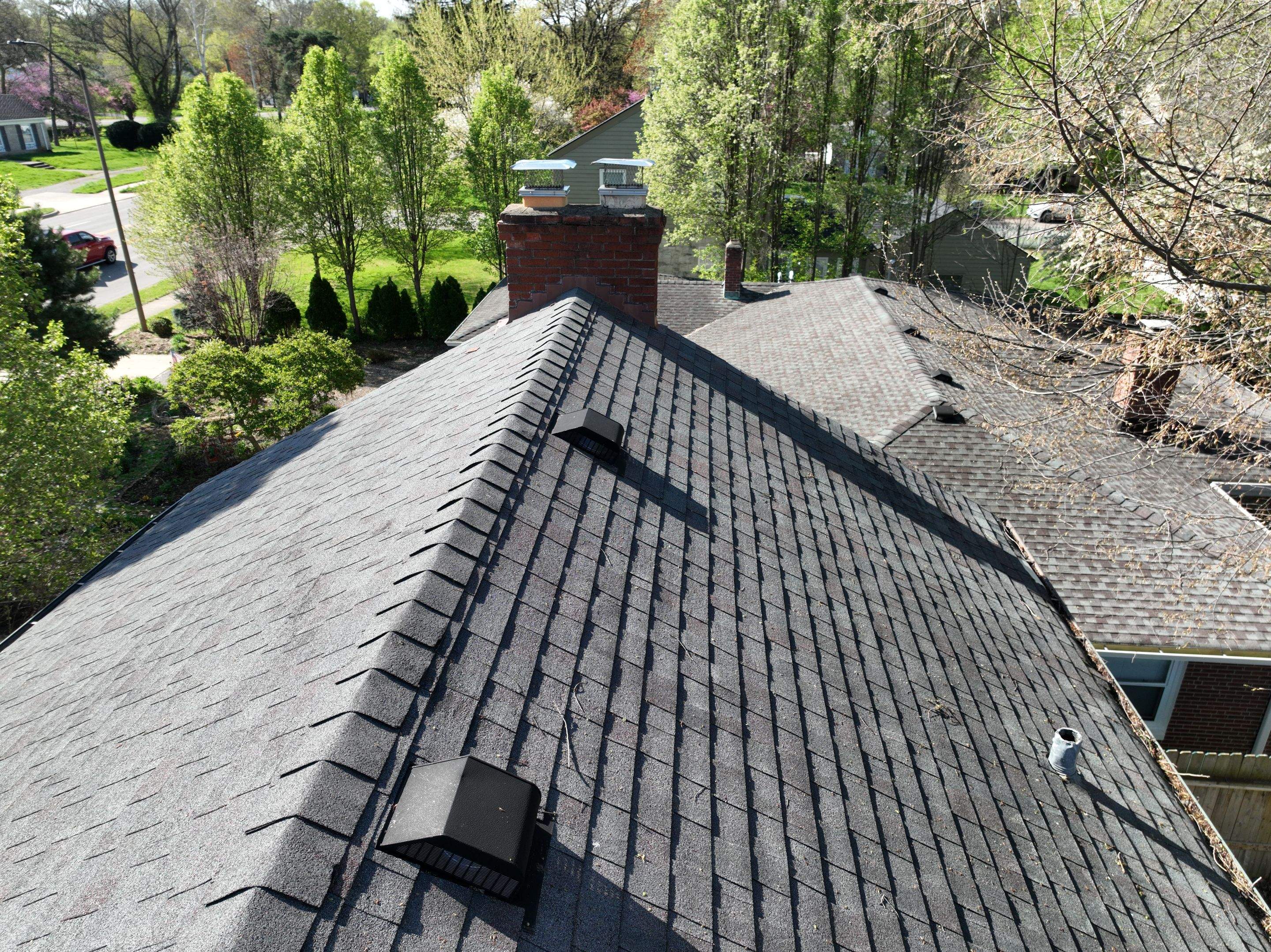 Oakridge Onyx Black and Black Gutters by 317 Roofing & Restorations