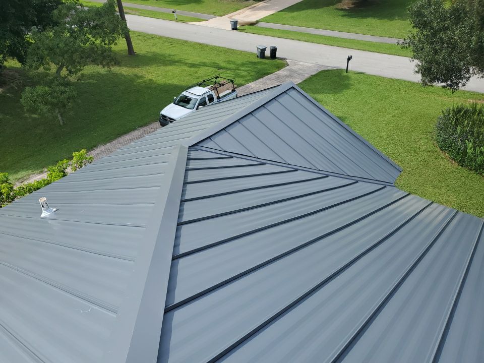 Residential Roofing Installation using 1" Nail strip metal roof by BLUES BROTHERS ROOFING