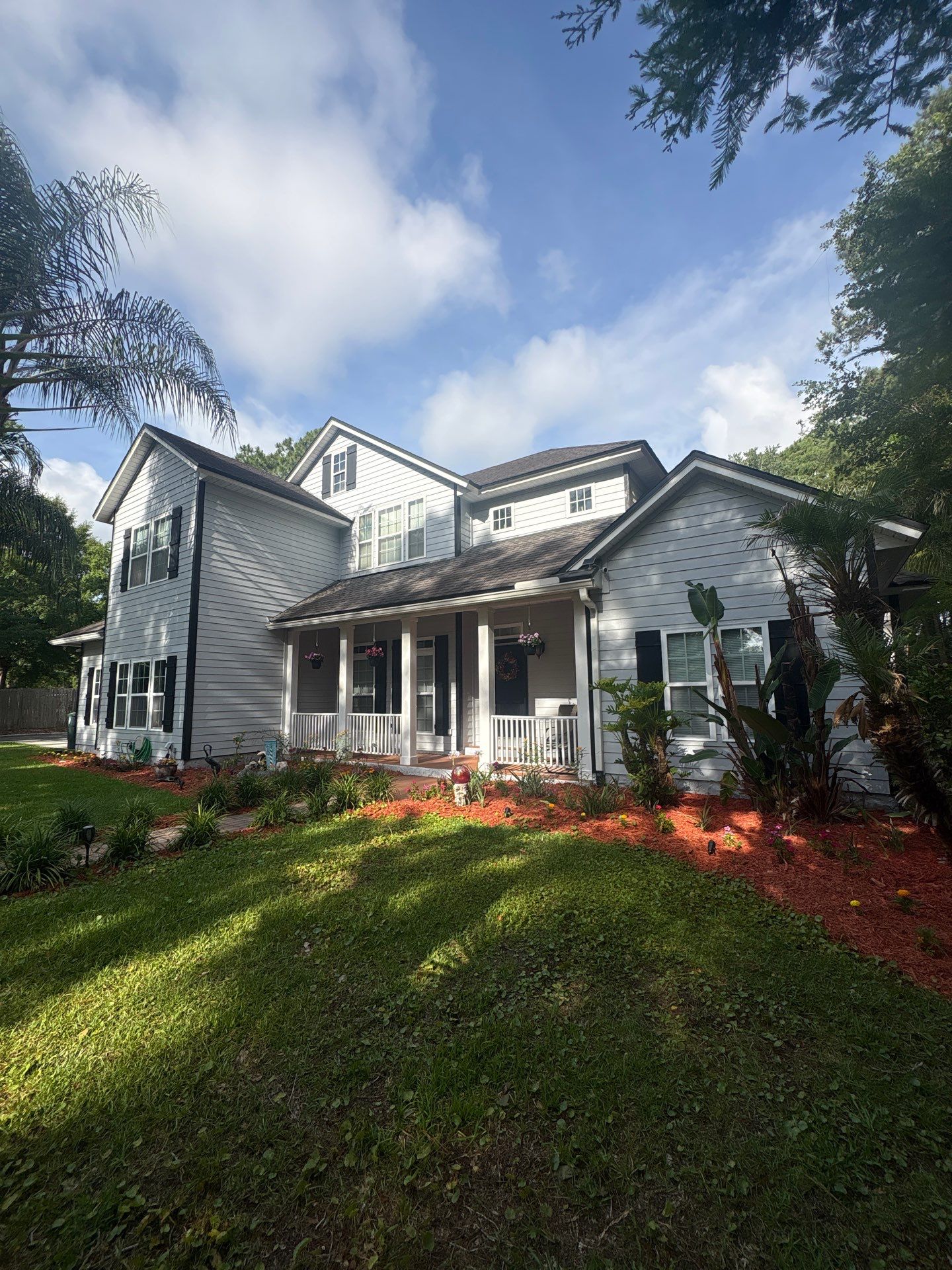 Complete Onyx Black Asphalt Shingle Roof Replacement and Skylight Installation in Jacksonville by Trinity Restoration and Roofing LLC