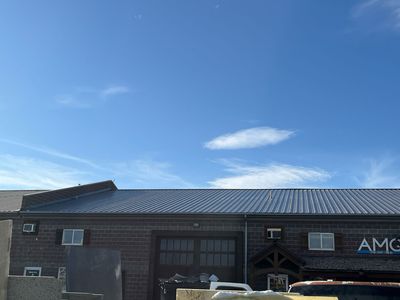 Commercial Roof Replacement – PBR Metal Panels After Hail Damage