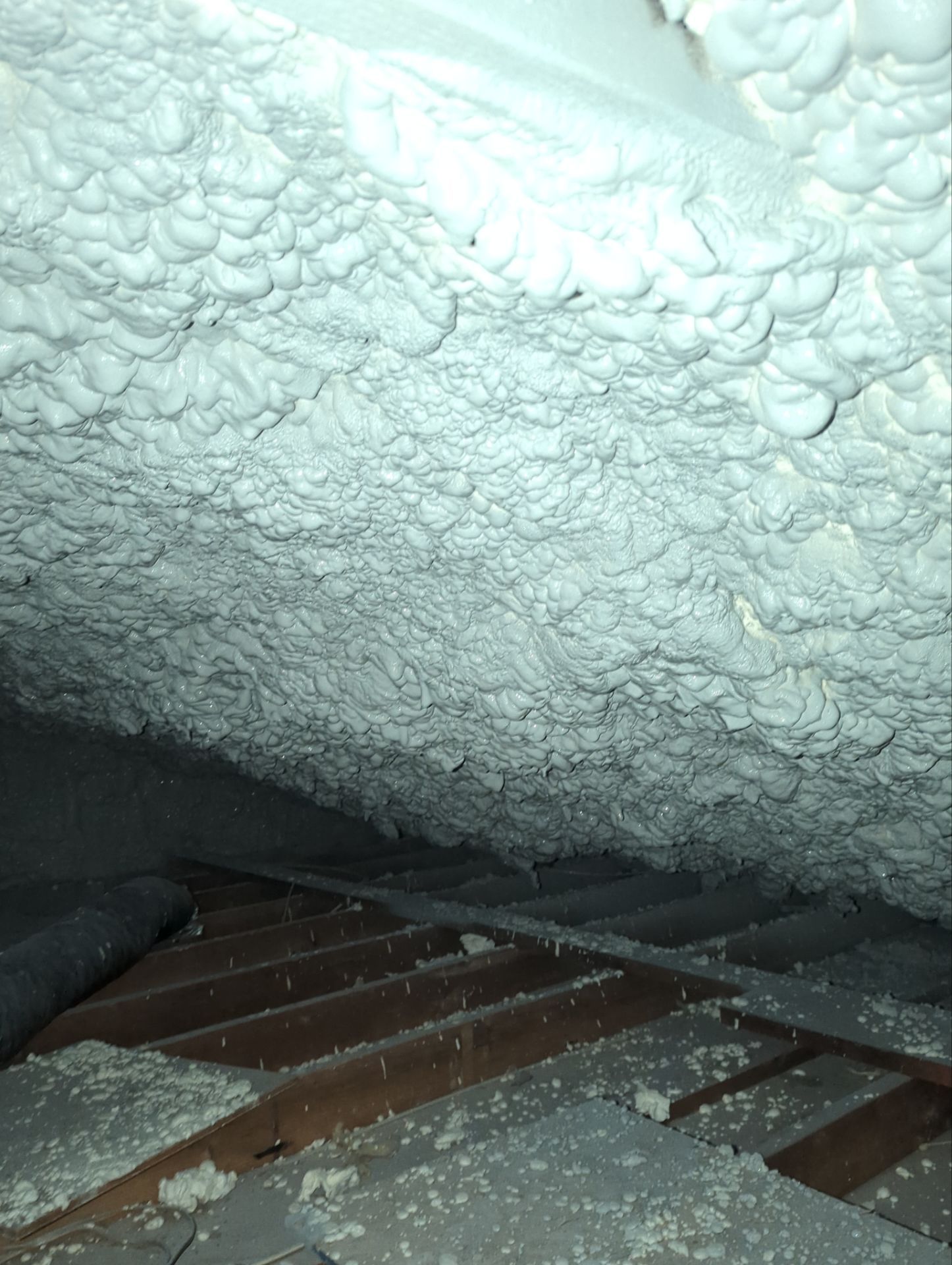 Attic Retrofit using open cell spray foam by NYS Foam & Energy