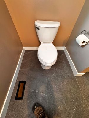 Bathroom Tile Floor Upgrade After Toilet Leak – West Vancouver Rental Property