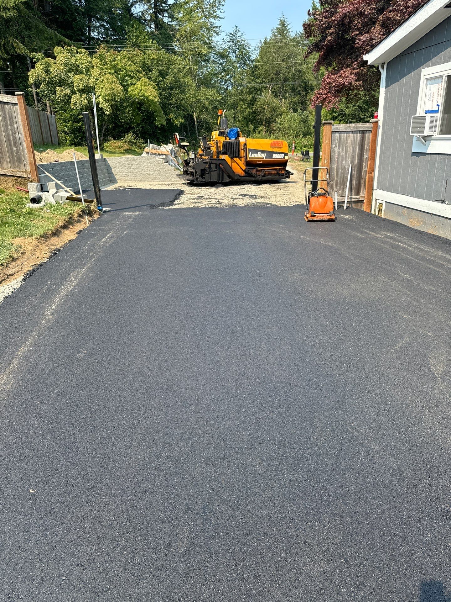 Joann | Asphalt Driveway & Retaining Wall  by Jireh Asphalt & Concrete Inc 