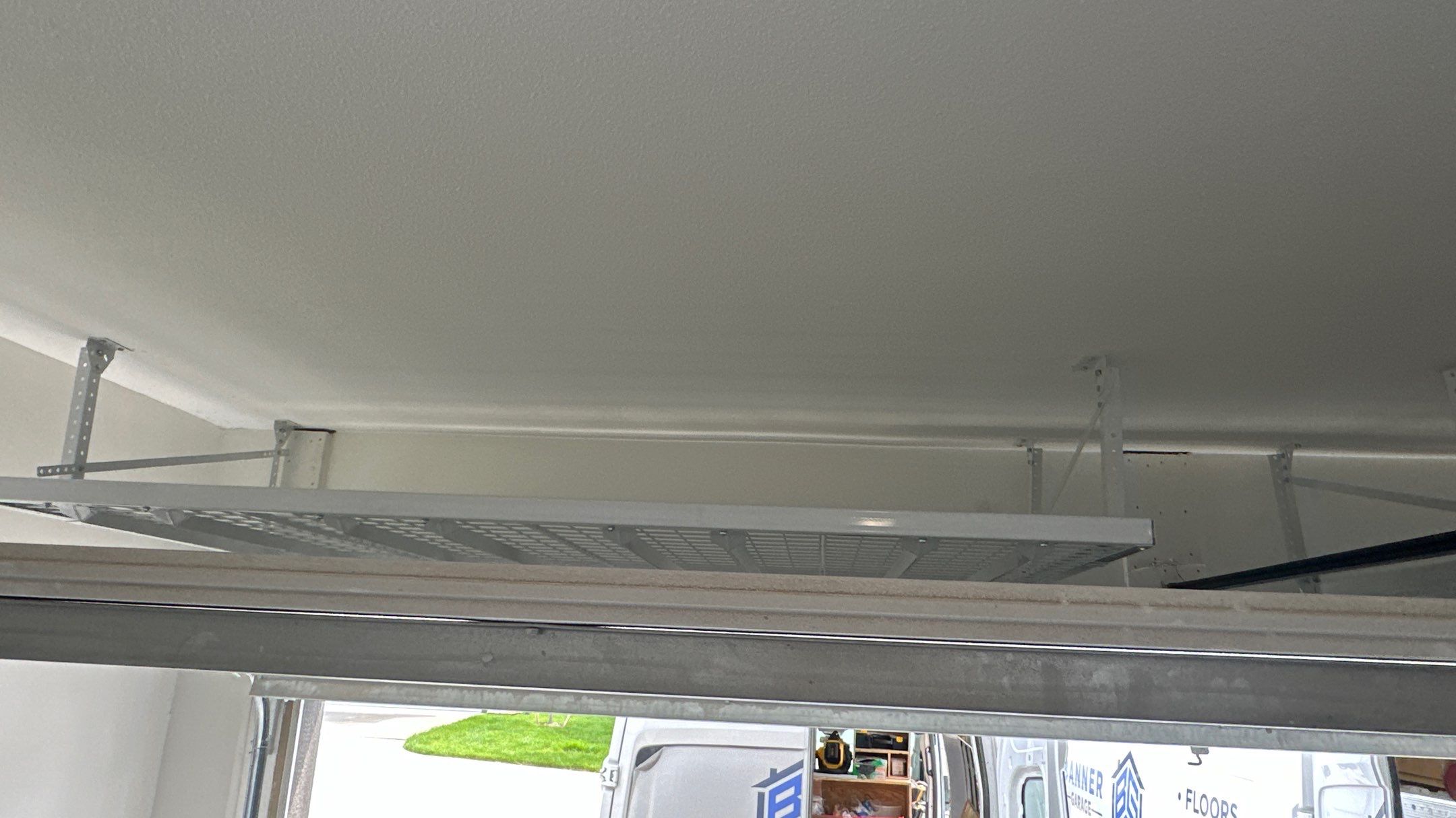Michael M. upgraded his garage with overhead racks and slotwall by Banner Garage