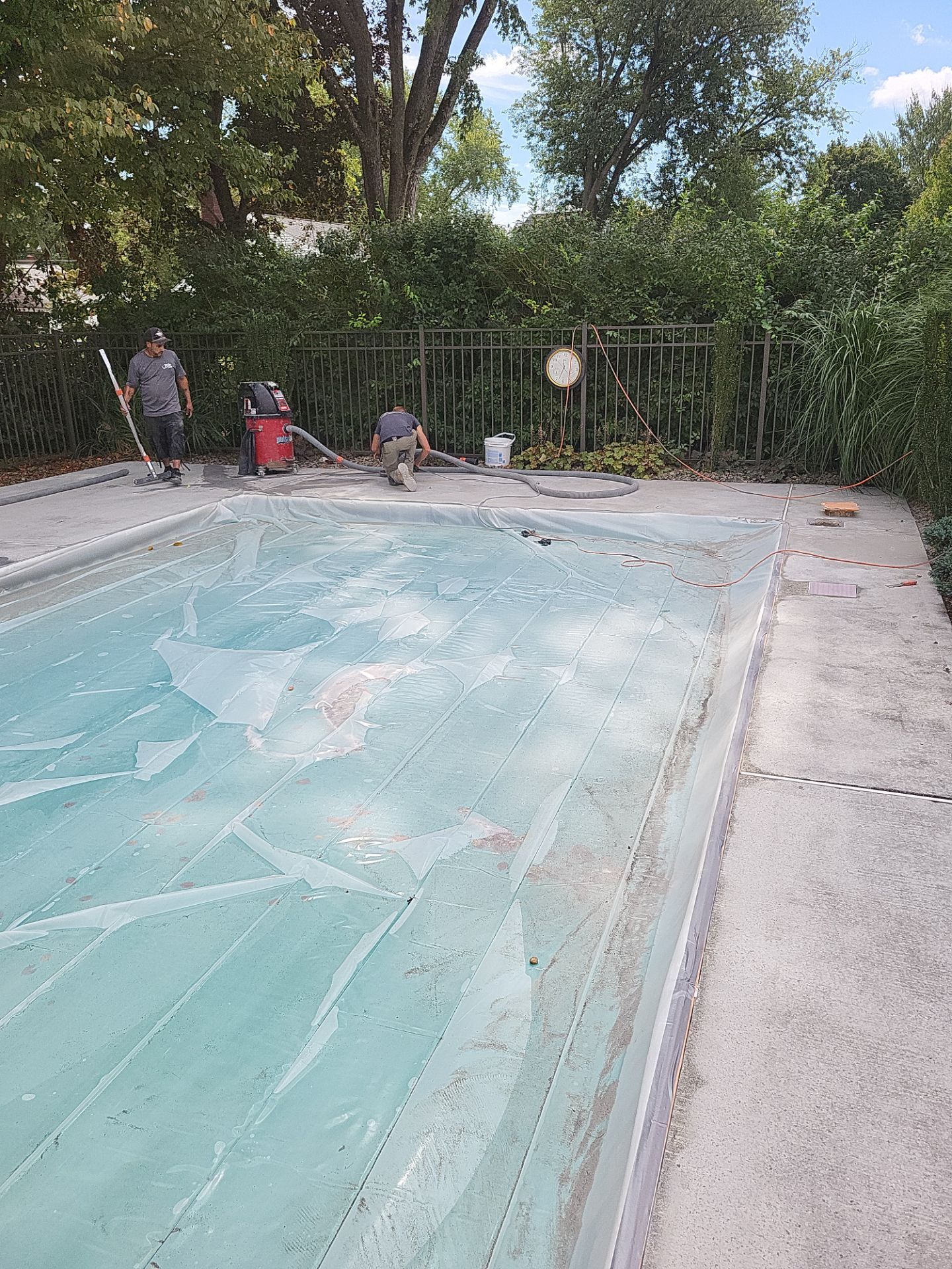 Blue Granite Pool Patio Concrete Coating in Lincoln Park by Spectrum Painting, LLC