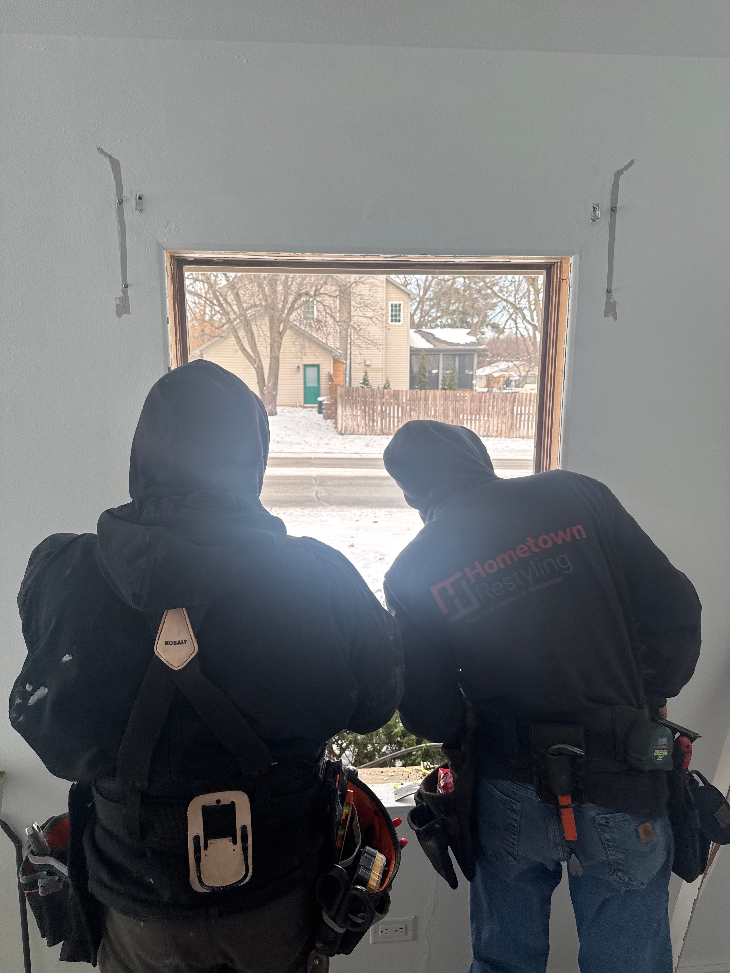 Black-Frame Pella Lifestyle Upgrade on a Partial Brick Home by United Windows and Siding LLC